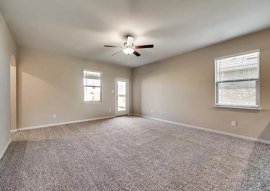 Neutral-toned carpeting throughout