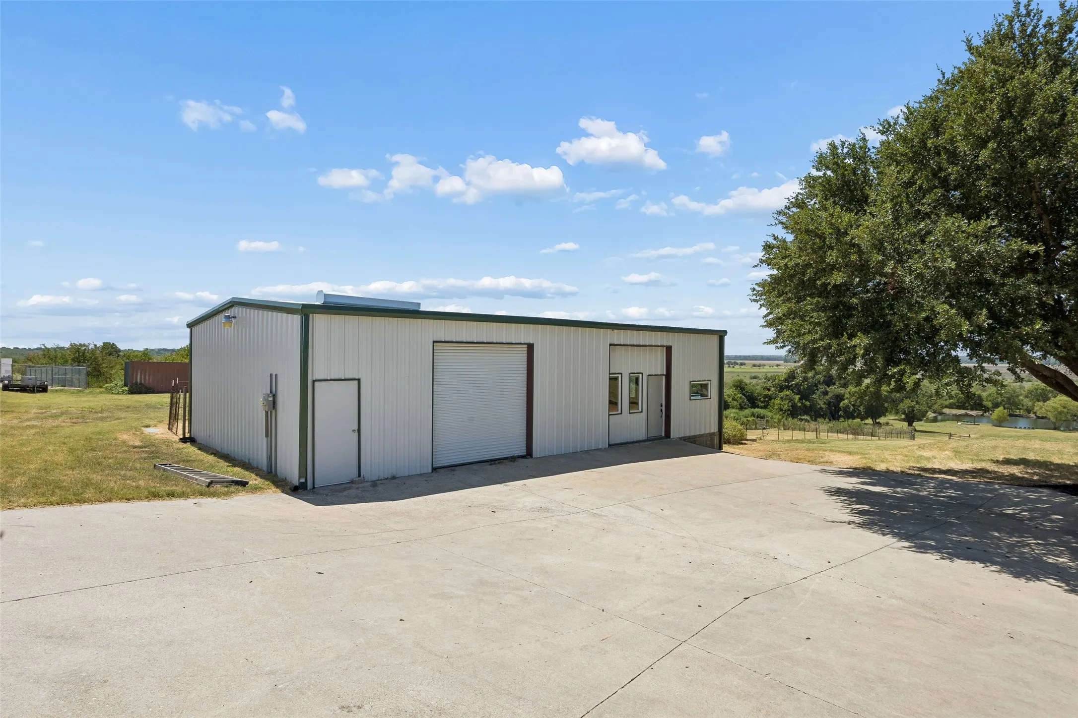 Metal shop with MIL or Guest Suite adjacent to shop.