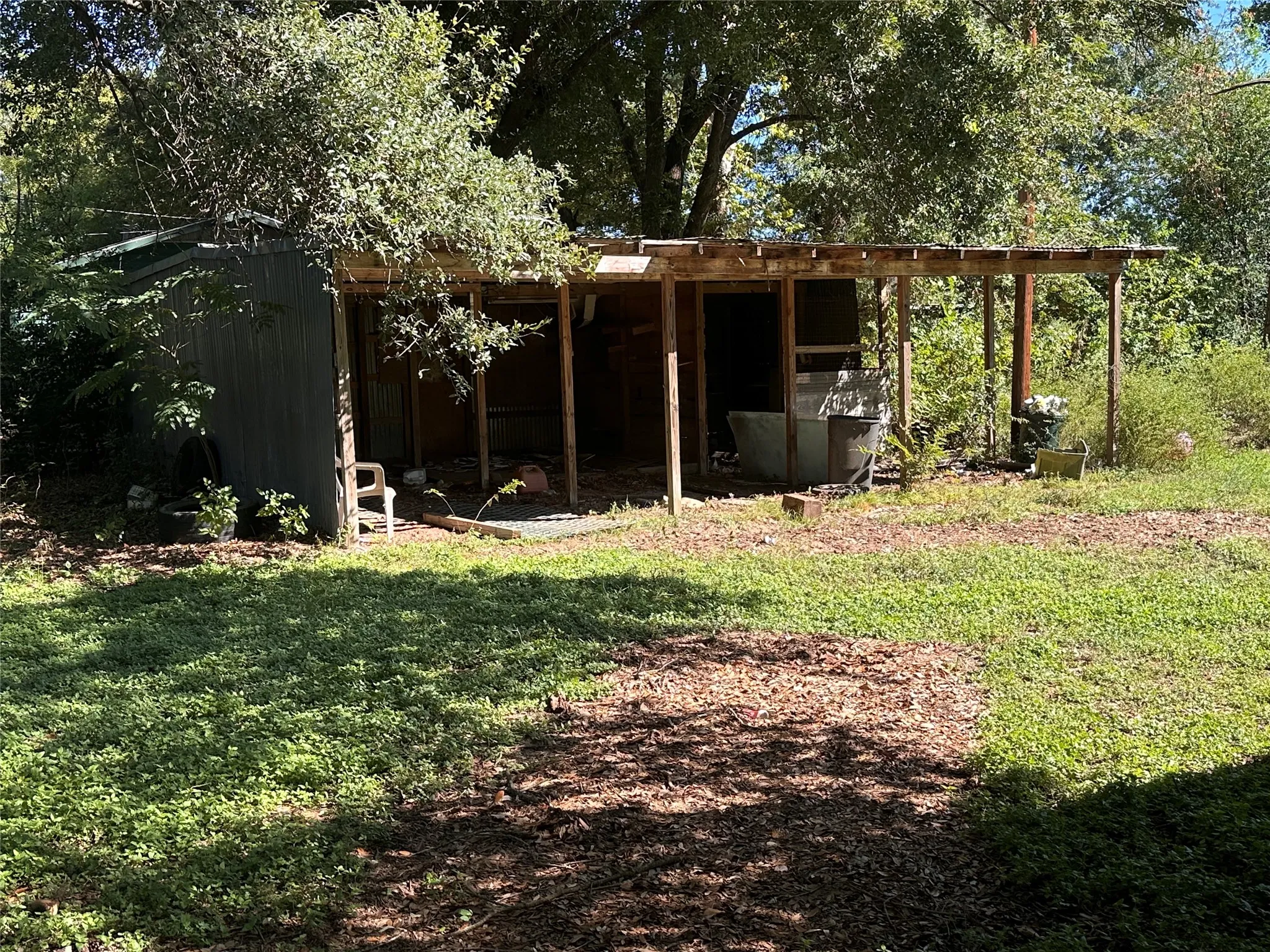 2 Car Garage, with room for a workshop and Chicken coop