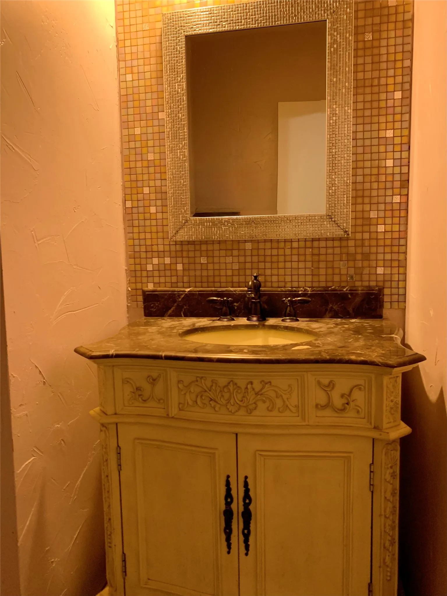 En-suite bathroom with shower and vanity.