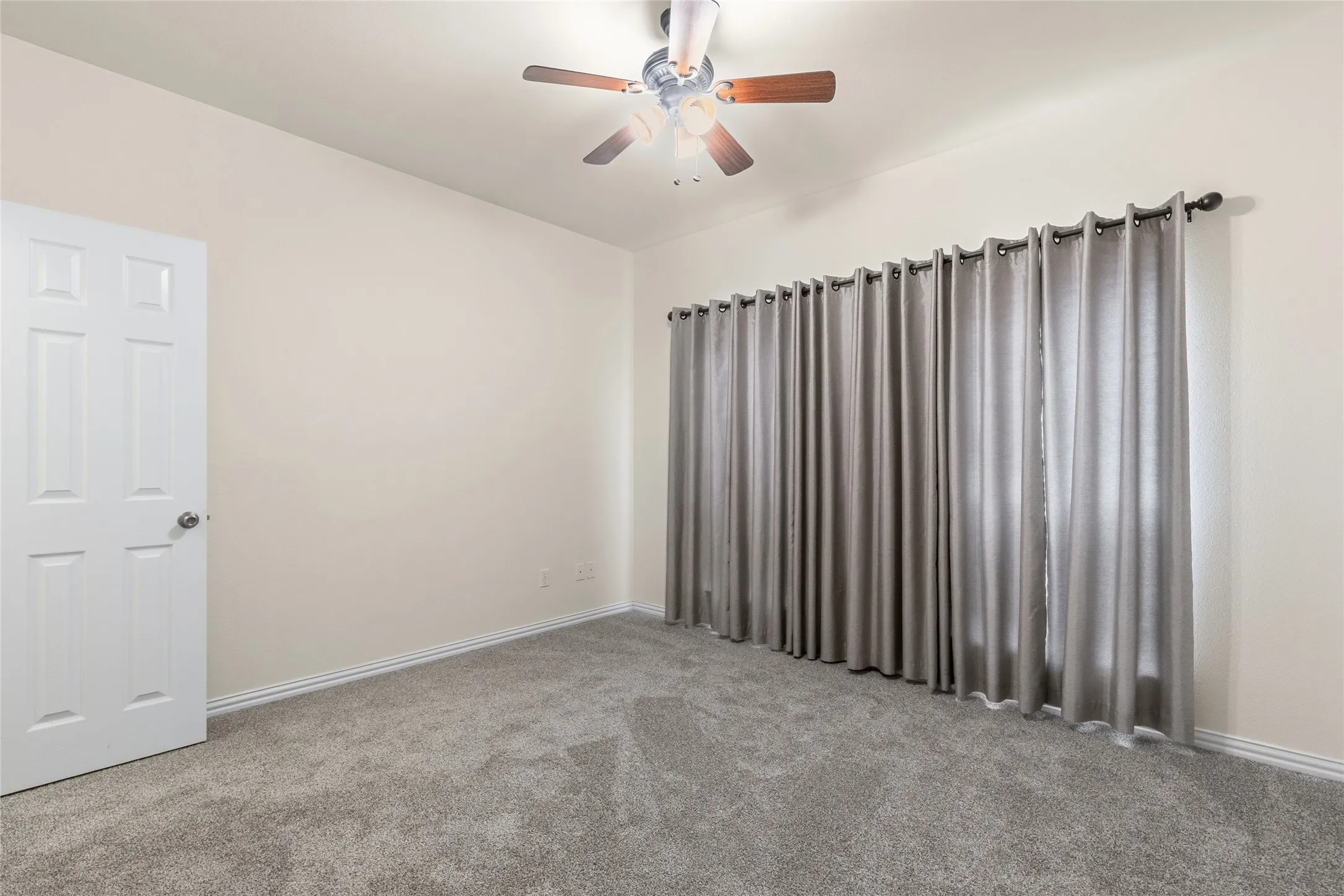 Secondary bedroom with walk in closet
