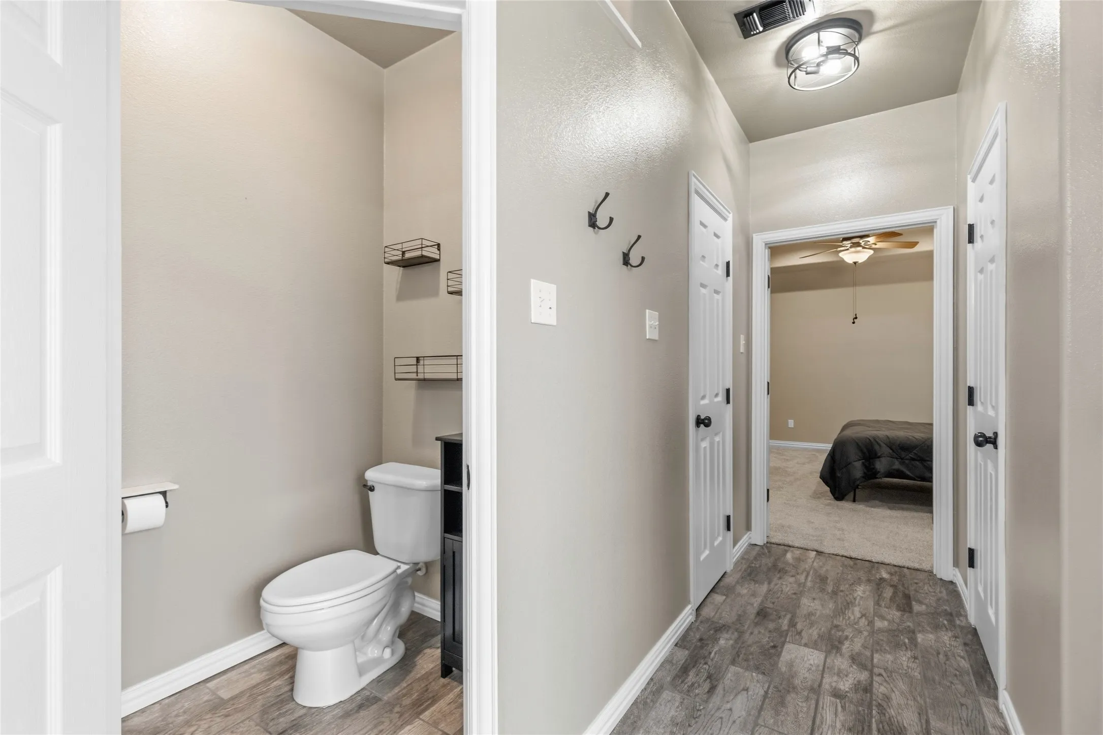 Spacious master bath with two walk in closets.