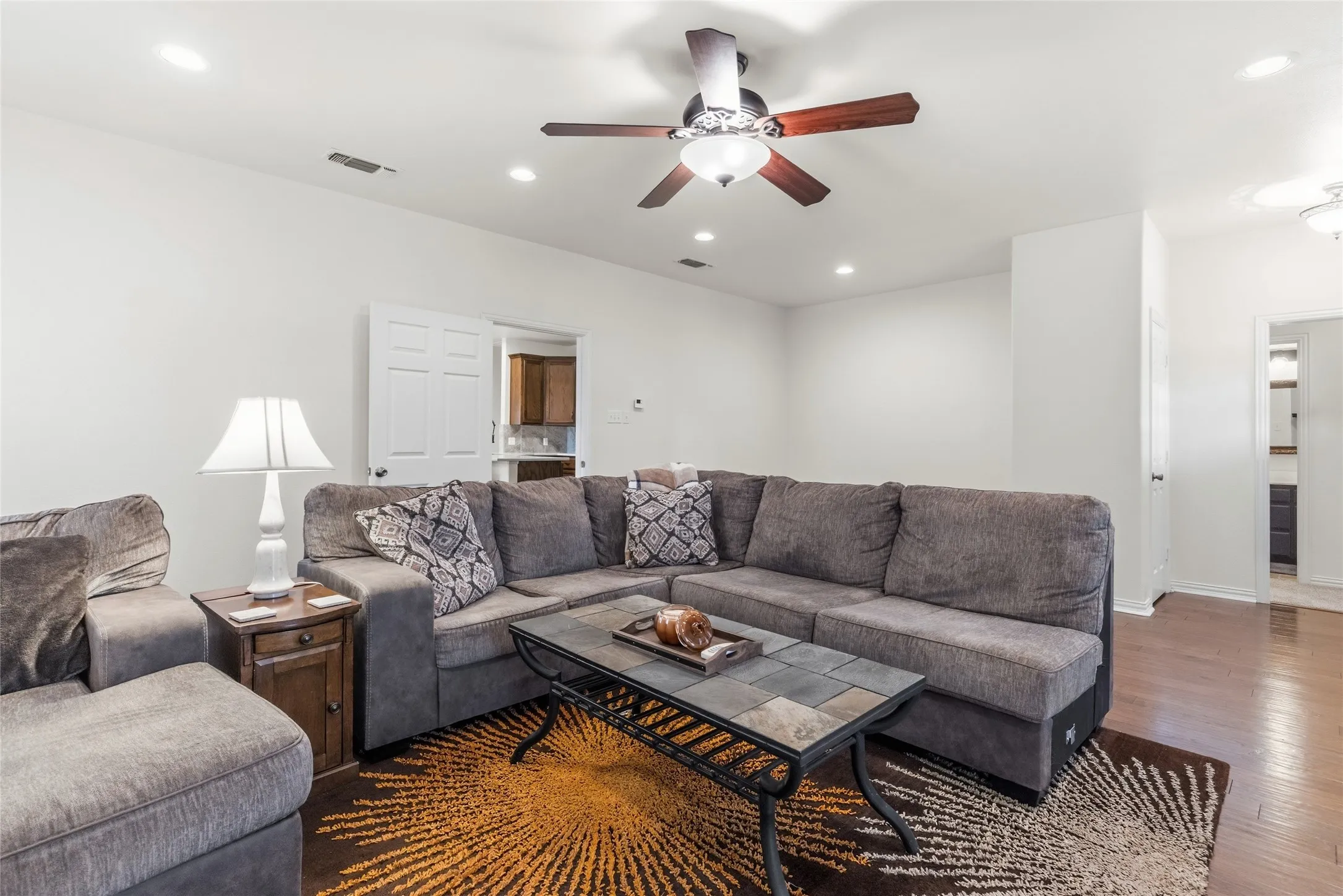 Spacious living room with a small nook perfect for a home office