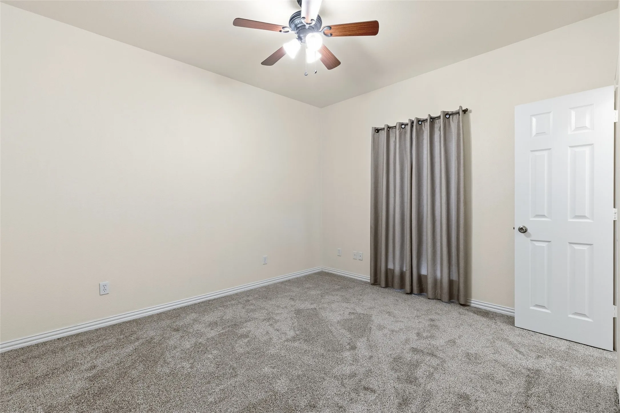Secondary bedroom with walk in closet