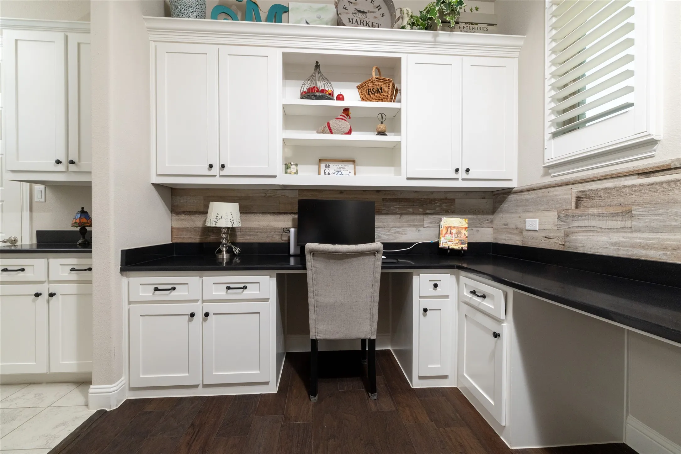 Office Area adjoining the kitchen with two seating areas and desk space for two.
