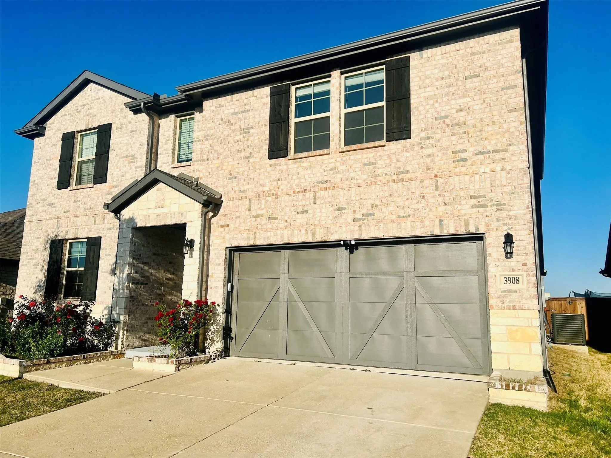 Brick veneer exterior with stone accents