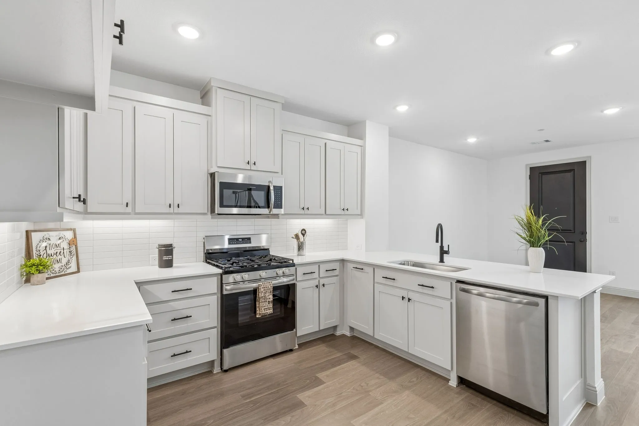 The chef will never be left out of the party in this open concept dream home!