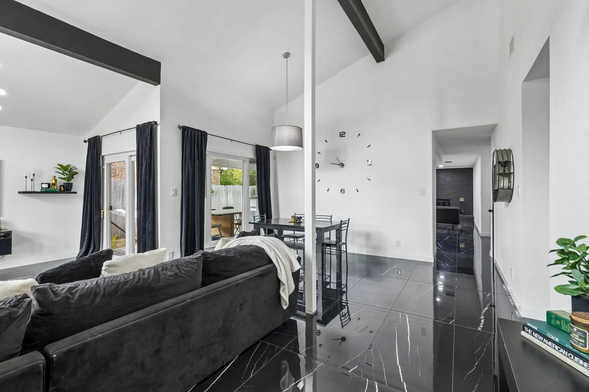 Living and Dining with soaring ceiling and beatiful tile floors!