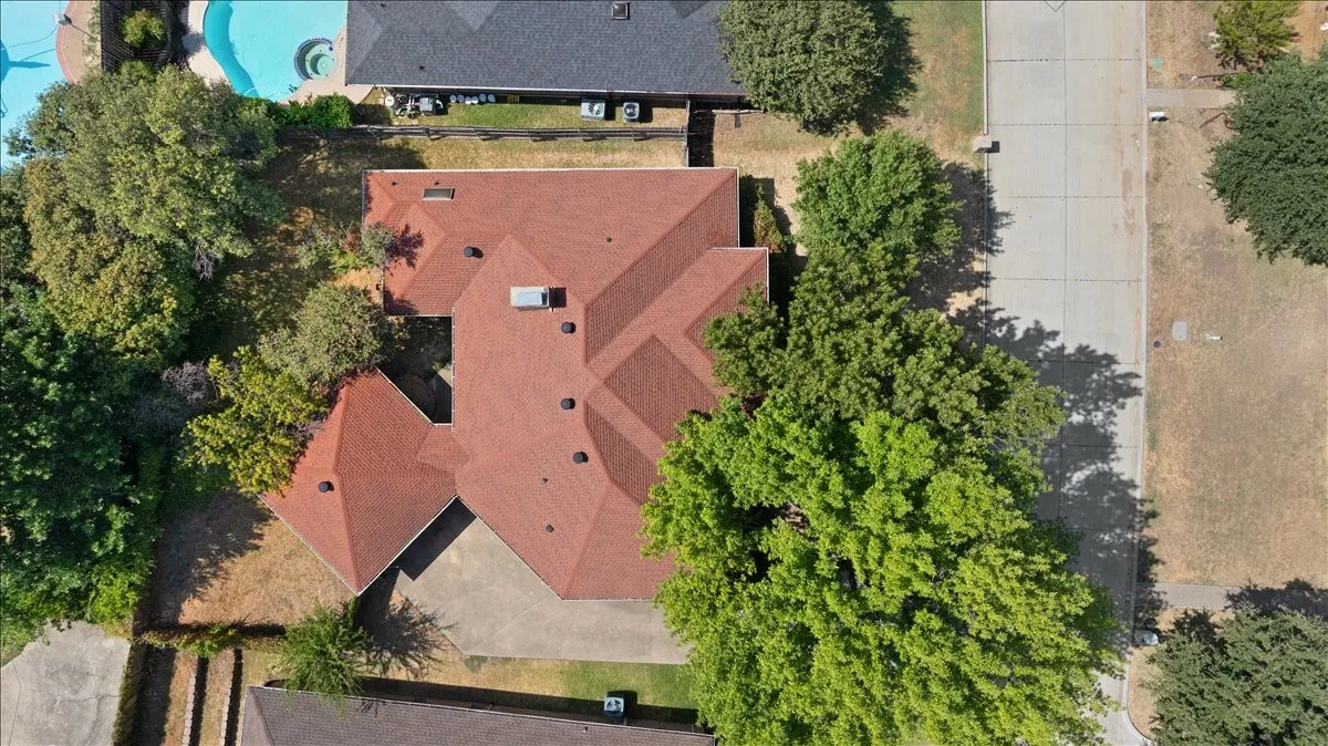 Red shingle roof with multiple gables