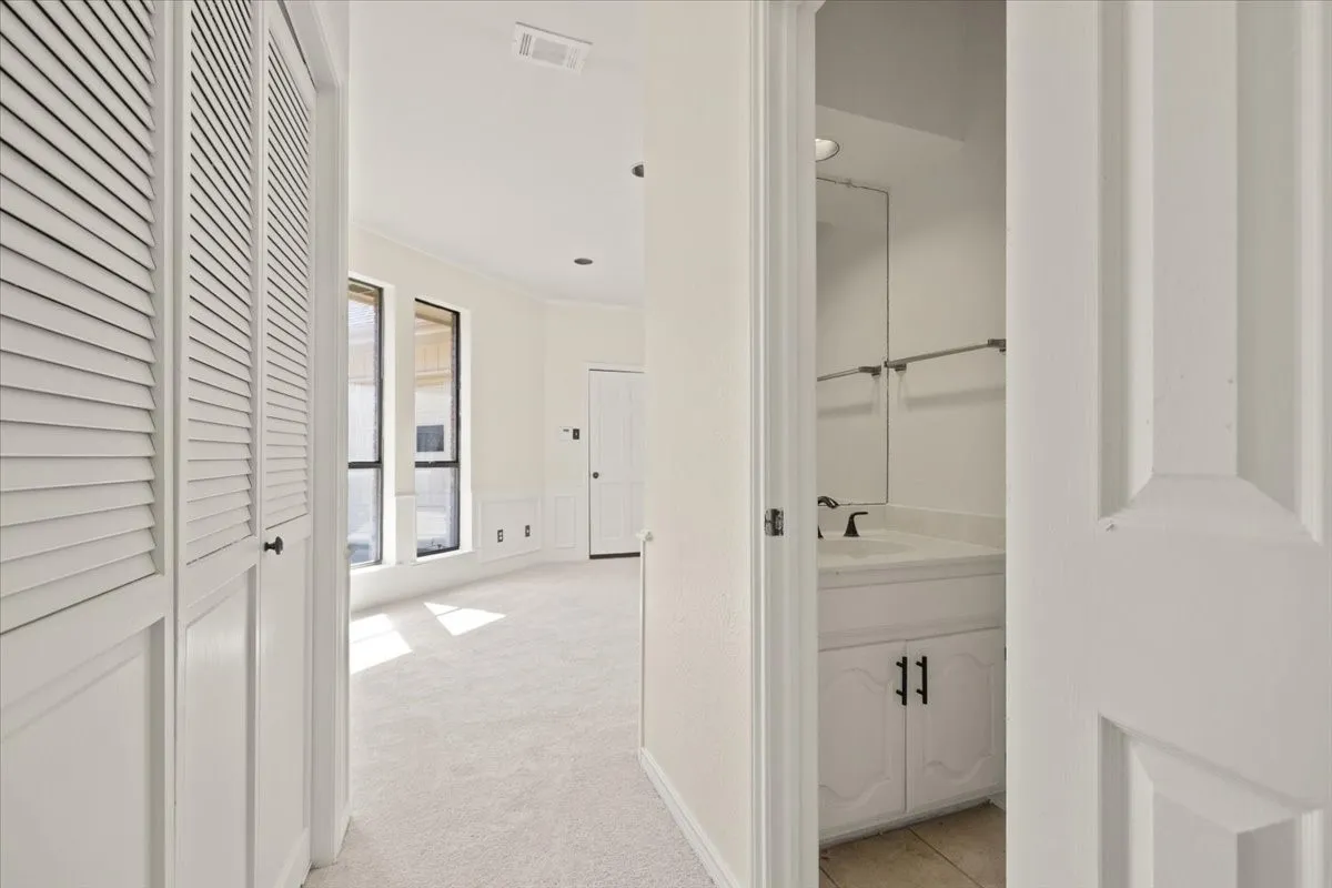 half bathroom entrance and laundry