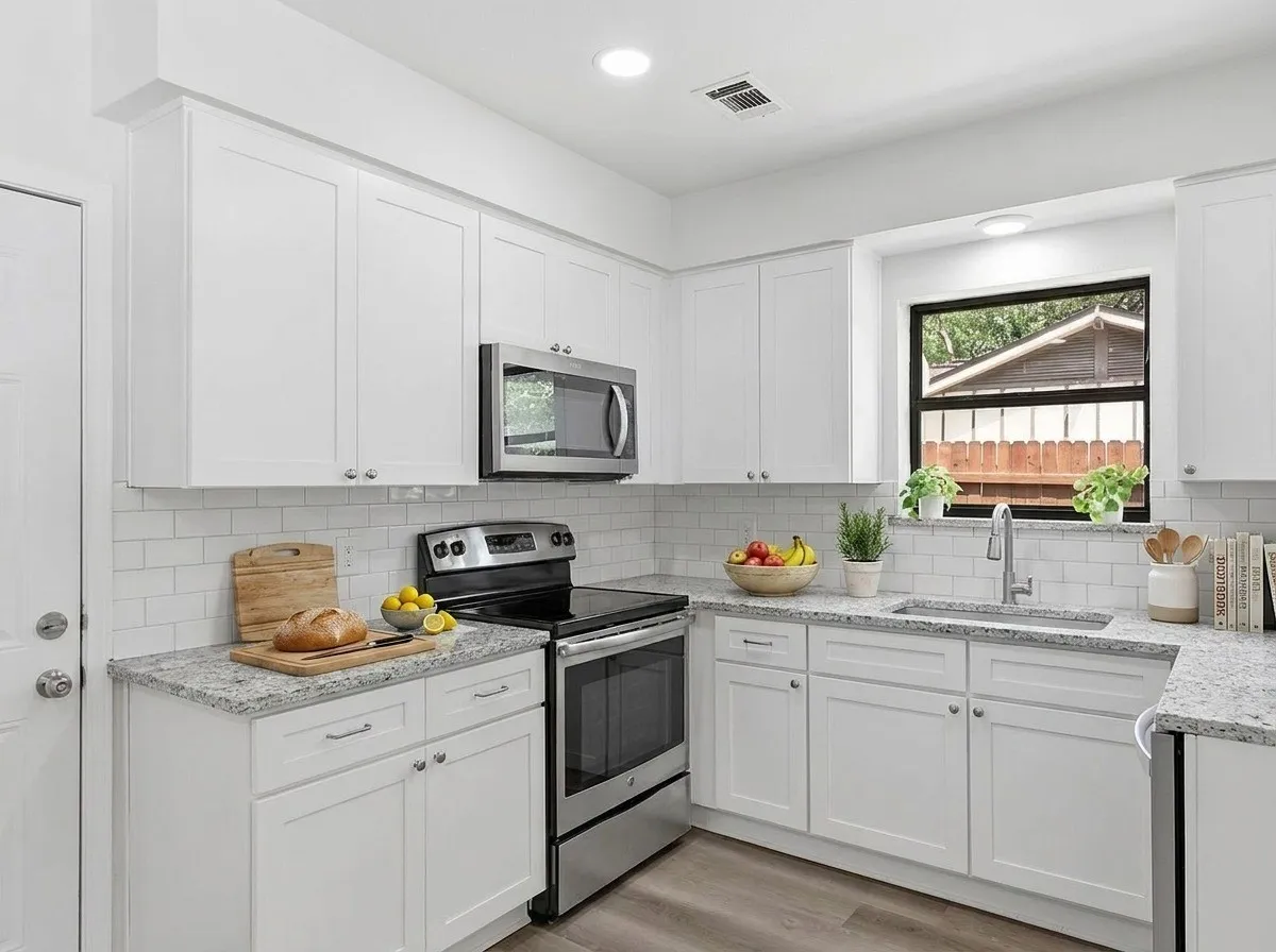 Virtually staged kit. Granite tops and New cabinets throughout.