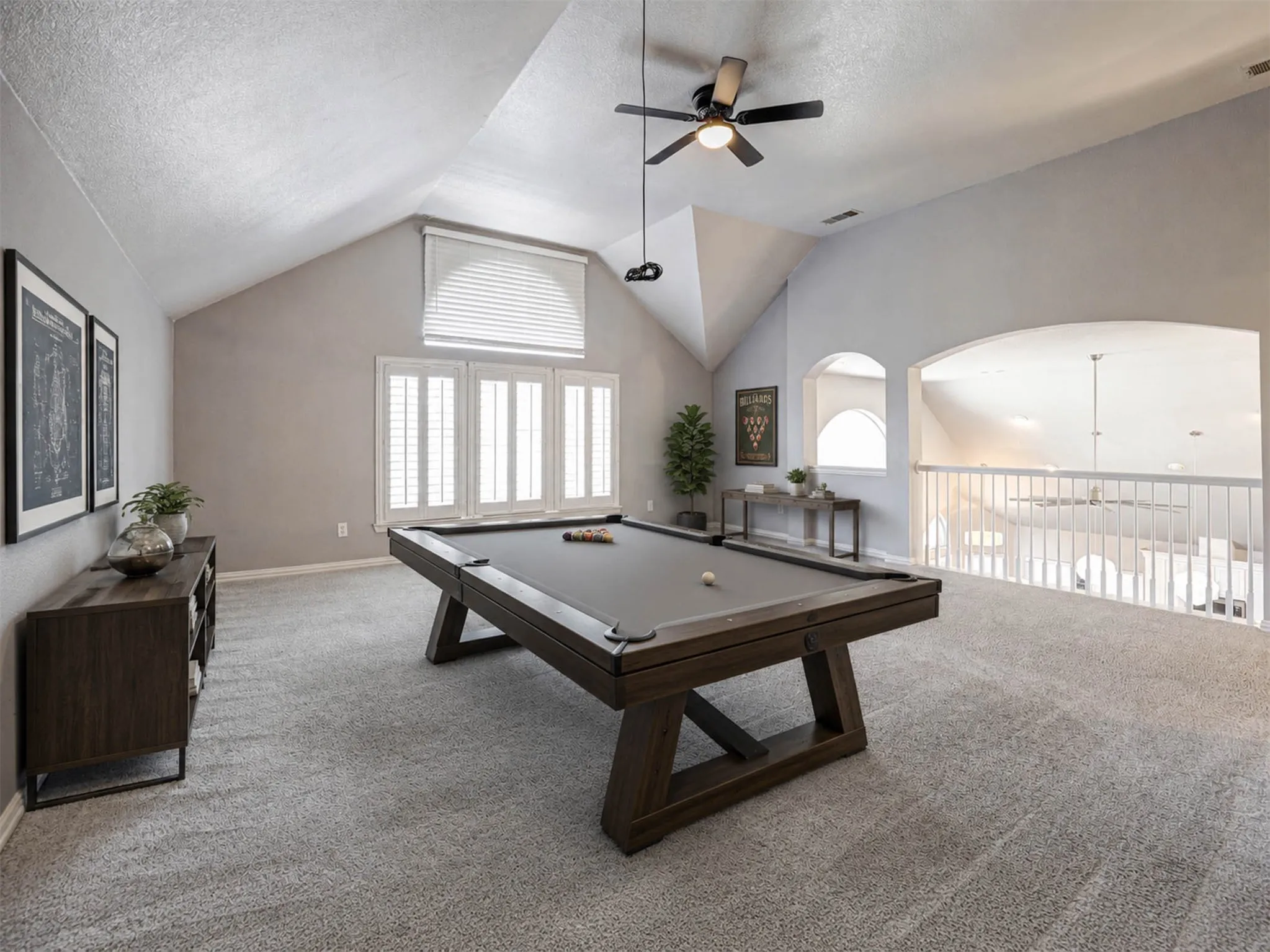 Shoot a game of pool in this spacious second-floor game room — the perfect hangout for family and friends. (Staged)