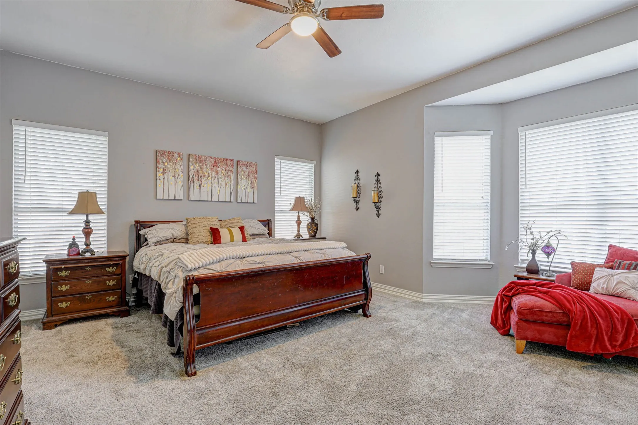 Generous primary suite with warm natural light and a tranquil atmosphere — your own private sanctuary.