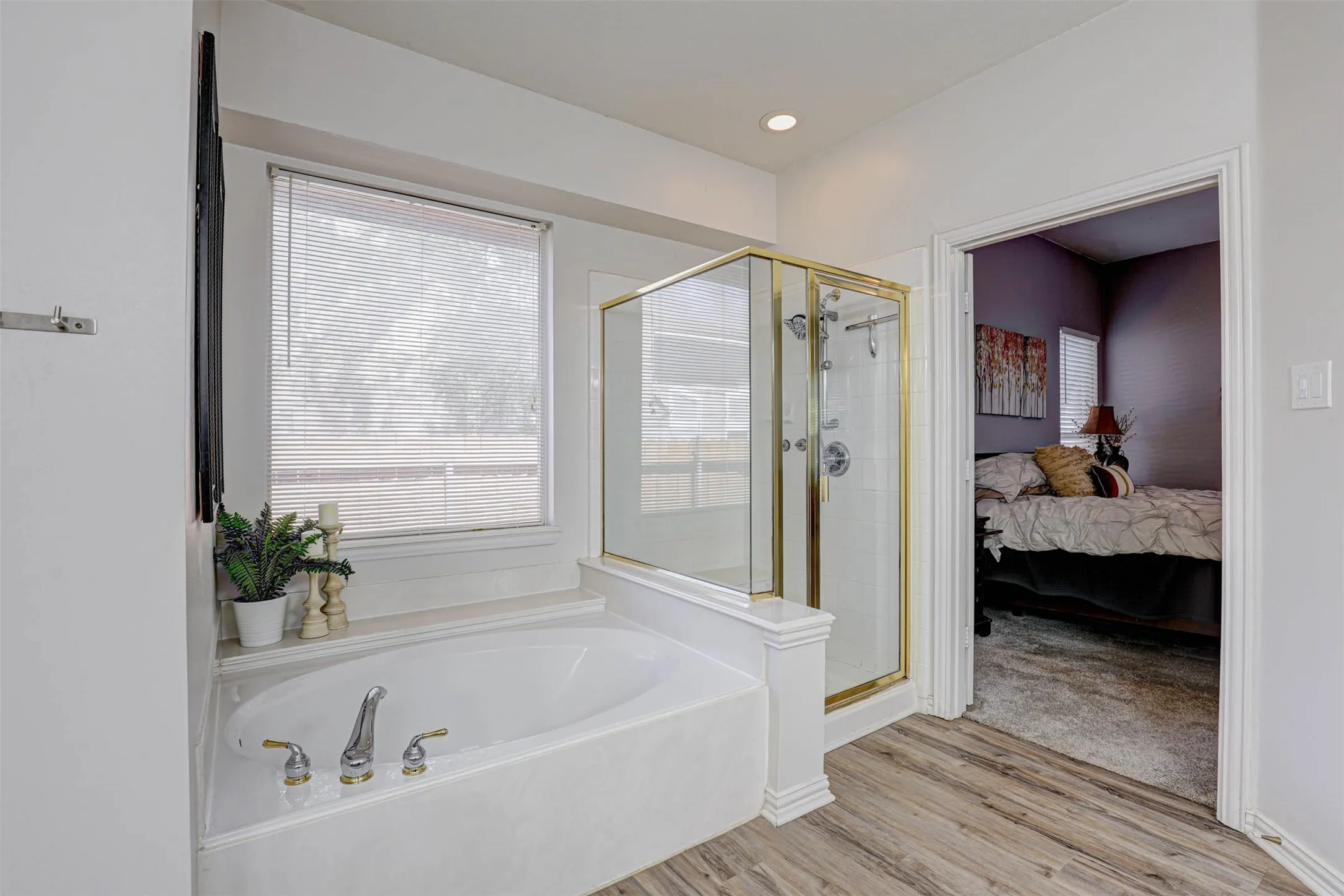 Unwind in the primary bath with a separate tub and shower — a spa-like escape at the end of the day.