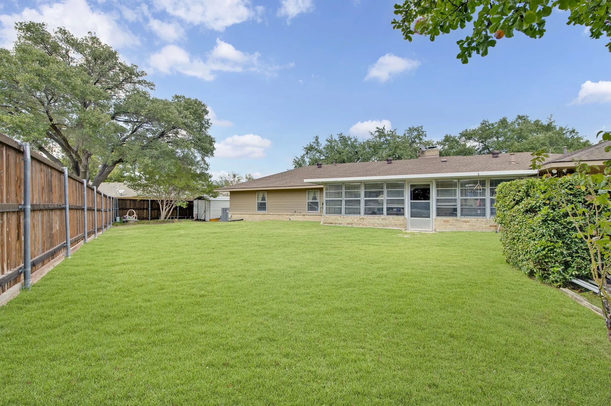 Large Back yard with storage building