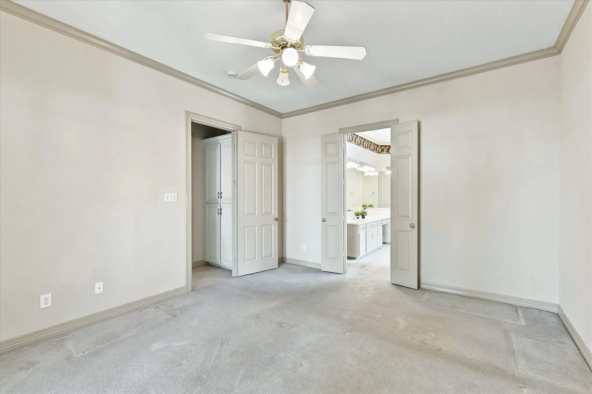 ensuite entrance to bath and walk in closet