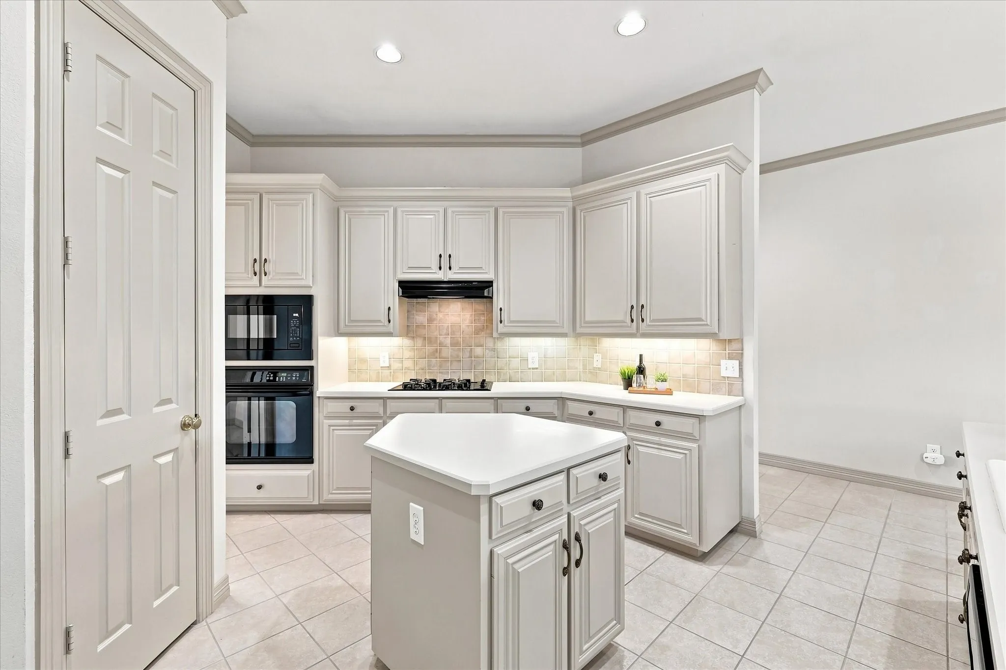 Island for easy flow for multiple workers in kitchen