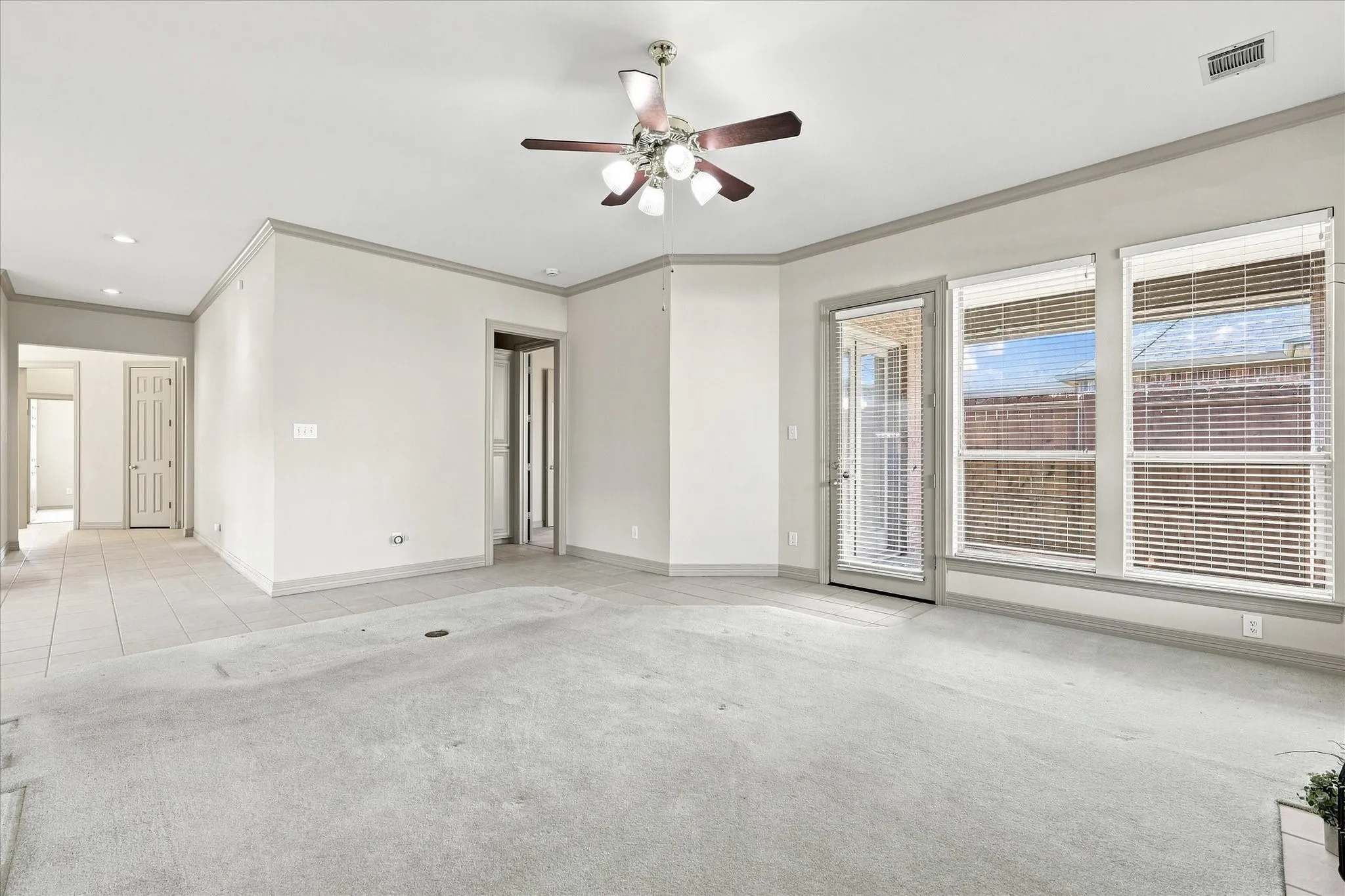 View from corner of family room toward primary bedroom