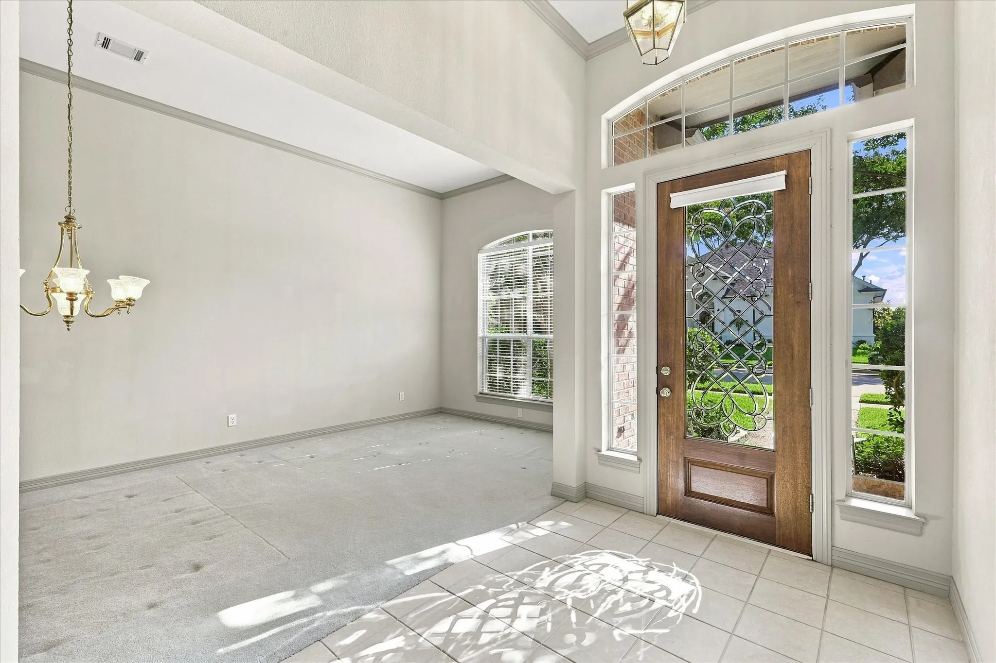 Living area with dining area off entry