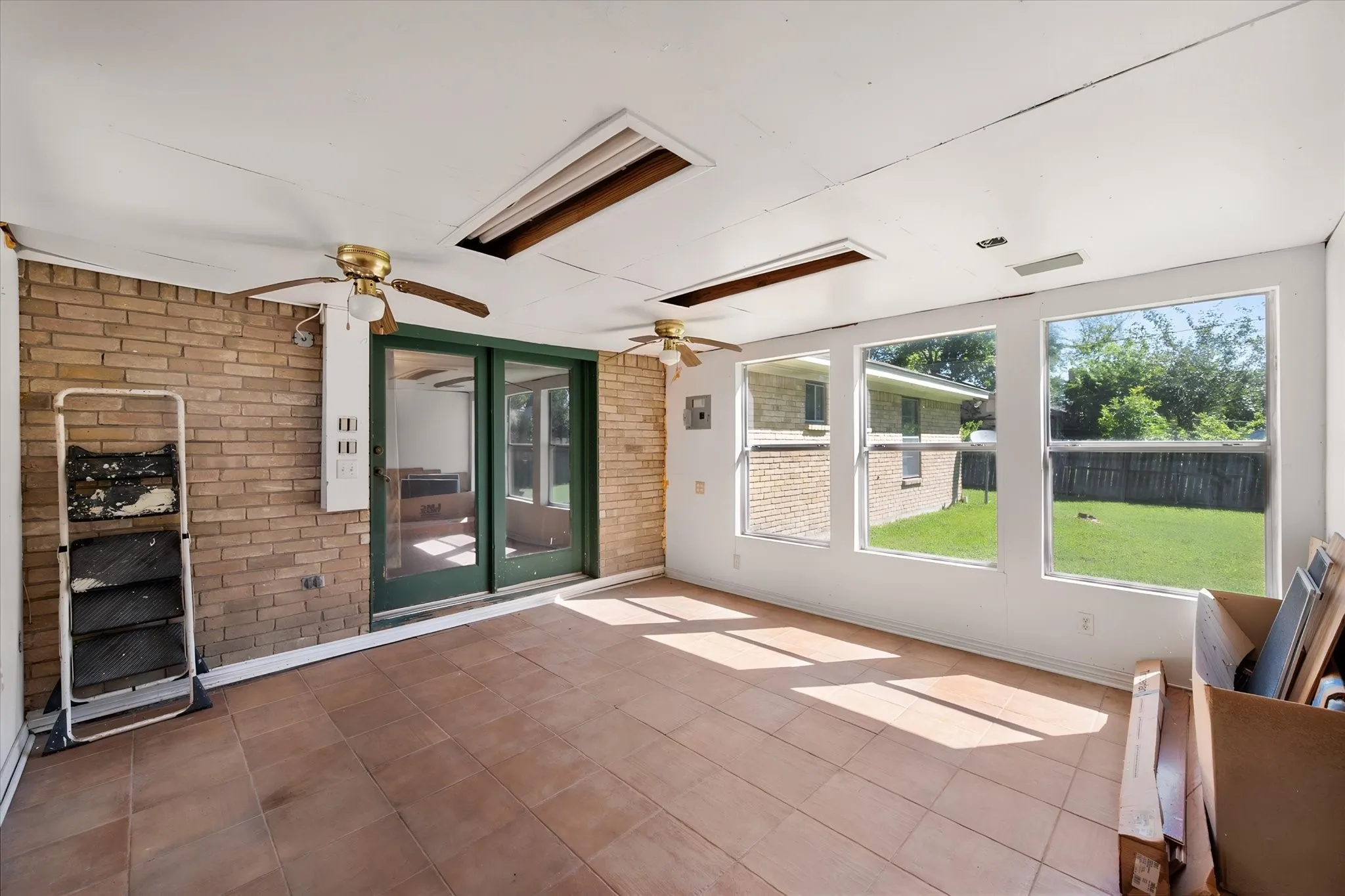 Enclosed sunroom needing some improvements.