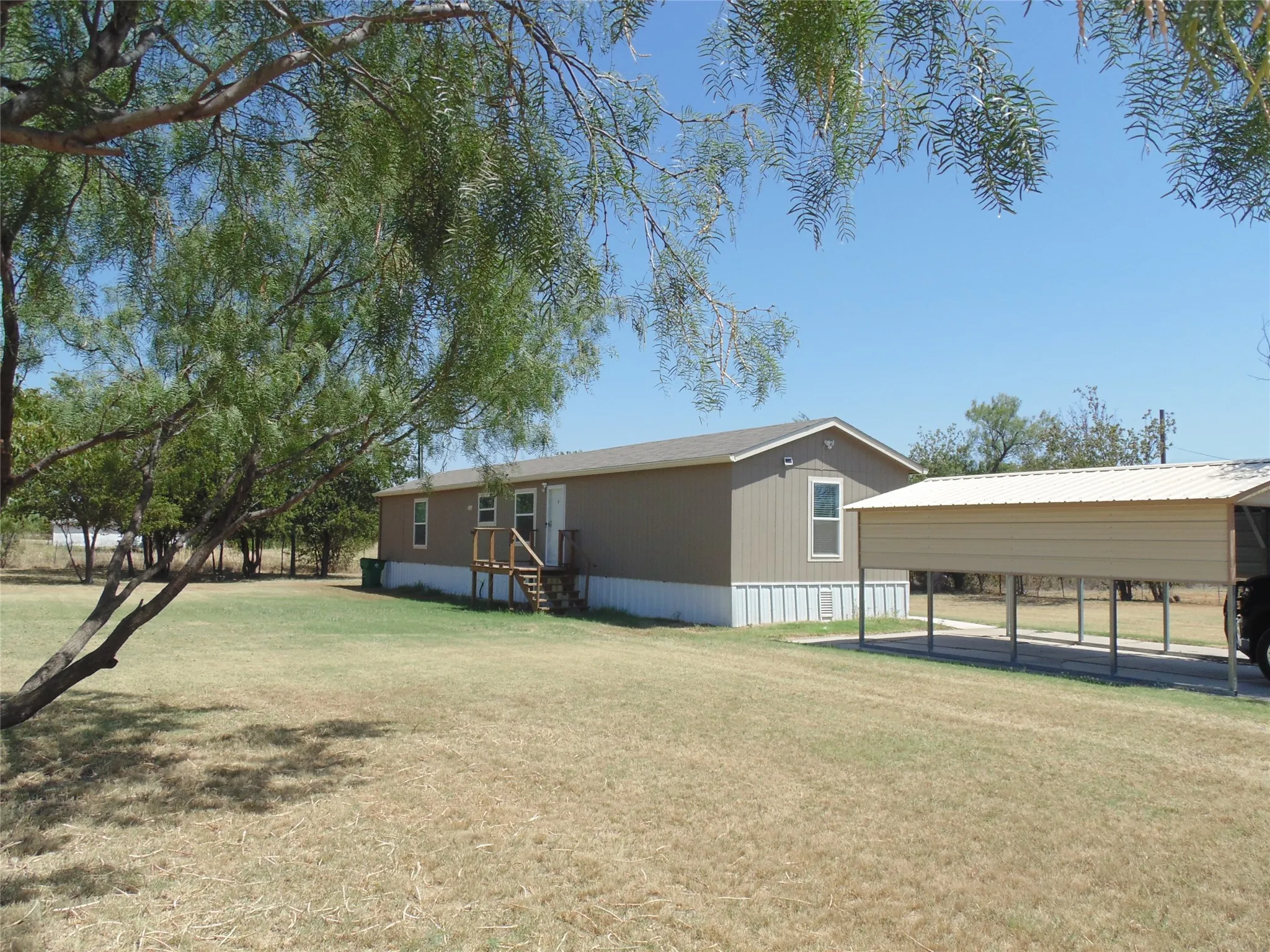 Mobile Home For Sale in Coleman County , 906 N Blanco Street, Coleman, Texas 76834, 3 Bedroom, 2 Bathroom, Garage spaces, 1,152 Sqft, built in 2023, mls#21368620, Real Estate Agent in Coleman, Homes For Sale in Coleman county, Homes For Sale in Coleman, Realtor in Coleman Texas, Real Estate Brokerage Independent Realty Texas, Luminita Cordes Realtor
