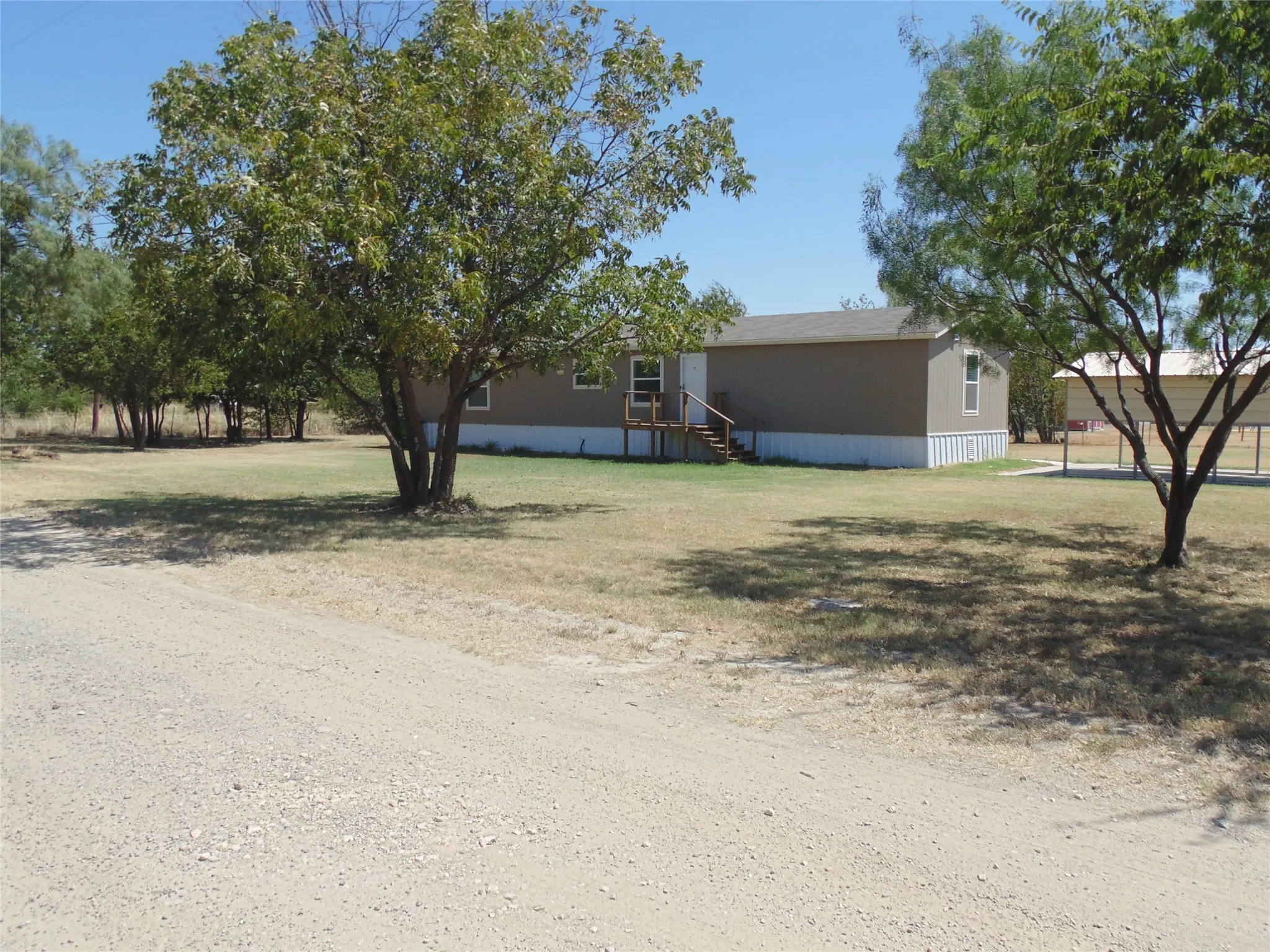 Mobile Home For Sale in Coleman County , 906 N Blanco Street, Coleman, Texas 76834, 3 Bedroom, 2 Bathroom, Garage spaces, 1,152 Sqft, built in 2023, mls#21368620, Real Estate Agent in Coleman, Homes For Sale in Coleman county, Homes For Sale in Coleman, Realtor in Coleman Texas, Real Estate Brokerage Independent Realty Texas, Luminita Cordes Realtor