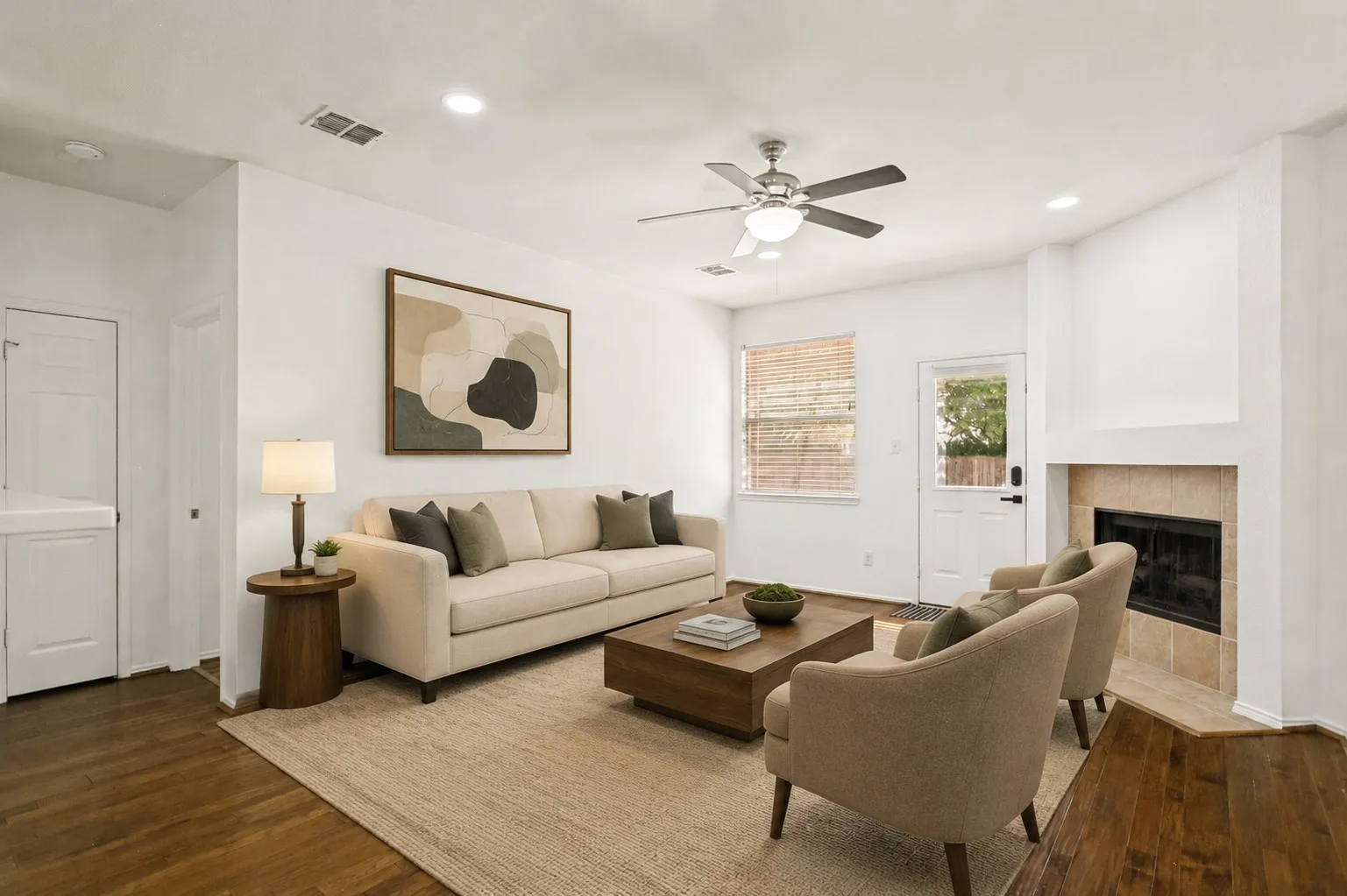 Wood-finish flooring throughout, recessed lighting, and a ceiling fan