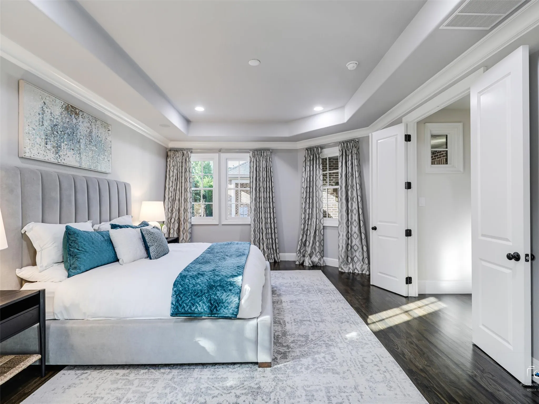 The luxurious primary suite offers a spa-inspired bath with custom cabinetry, quartz countertops, freestanding soaking tub, oversized glass enclosed shower, designer fixtures, and spacious custom walk-in closets. An oversized private study provides the ideal work-from-home space. A standout feature is the private attached casita with its own entrance, offering exceptional flexibility as a guest suite, multigenerational living space, private office, or creative studio. Upstairs, three generously sized secondary bedrooms each feature ensuite baths. A spacious game room with wet bar and wine cooler provides additional entertaining space, while the dedicated media room is perfect for movie nights and game-day viewing. The fully equipped fitness room offers the convenience of a private gym. The backyard is a true private retreat featuring a sparkling pool, expansive covered patio, built-in outdoor kitchen and grill, fireplace, and outdoor television. Whether hosting guests or enjoying a quiet evening.
