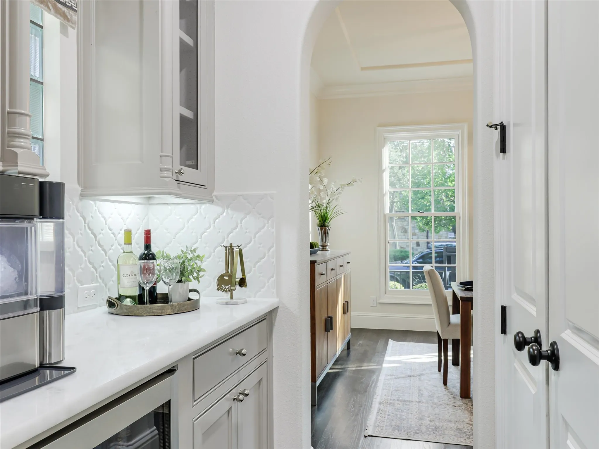 Butler's pantry leading to formal dining room.