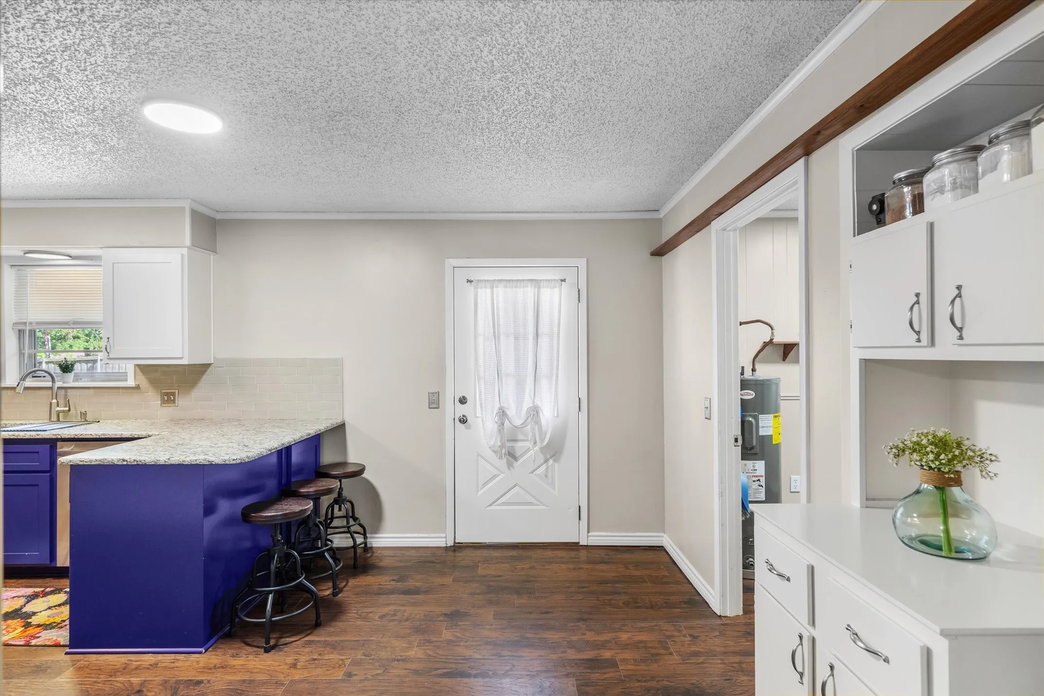 This kitchen has a built-in hutch that adds so much character