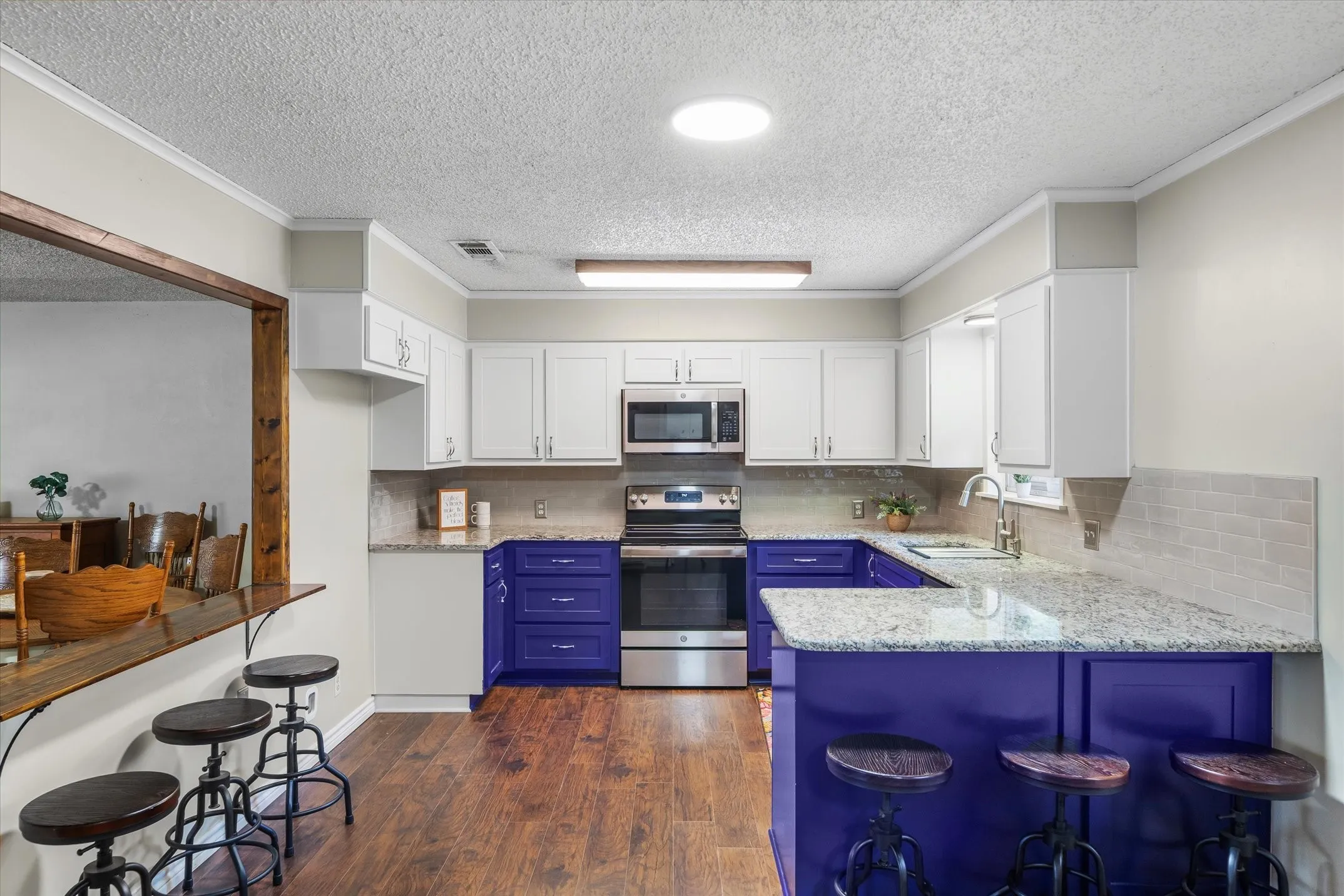 You will love the appeal of this warm and fun kitchen