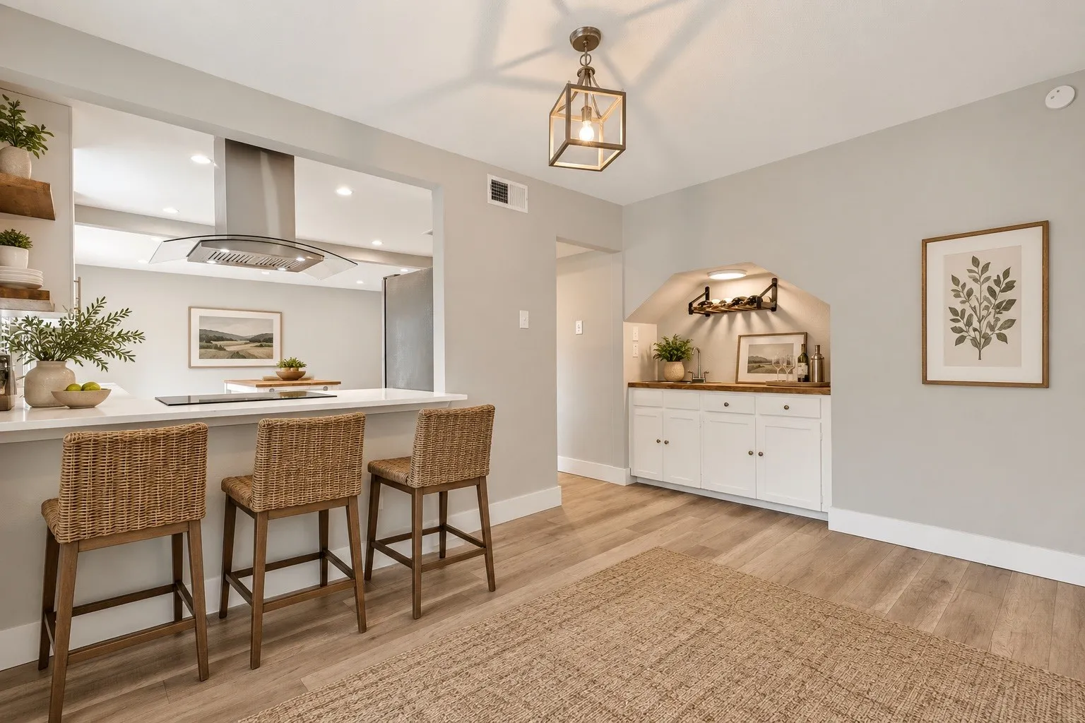 Formal dining open to the living and kitchen, complete with wet bar. Virtually staged.