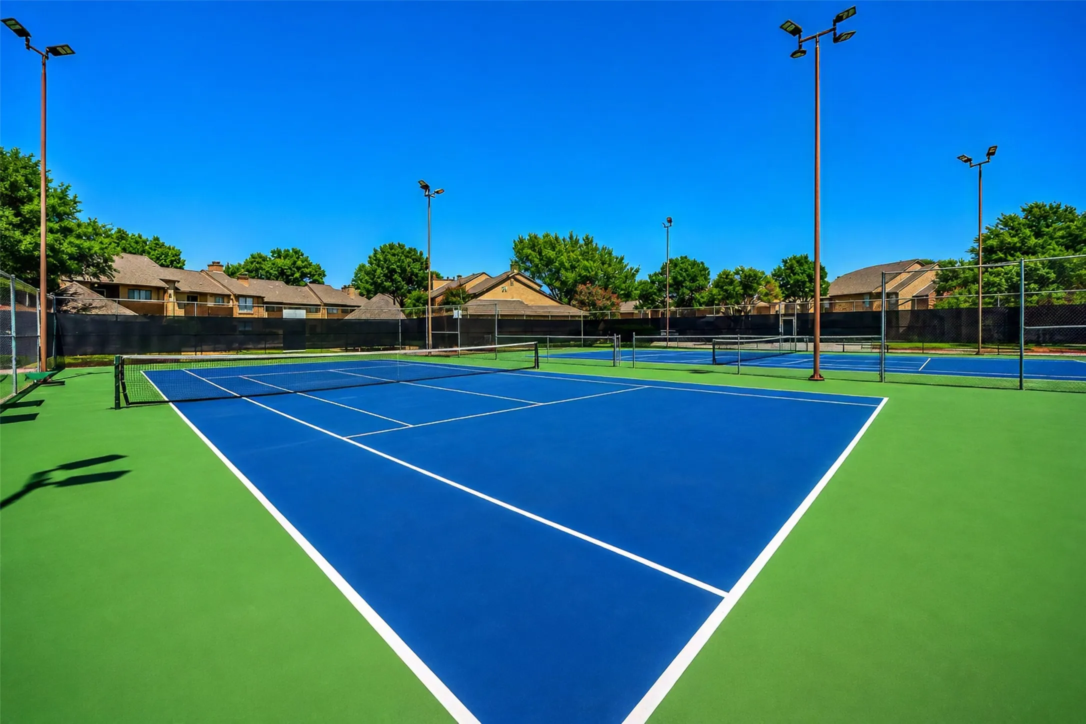 Grab a neighbor and a racket. Tennis anyone?