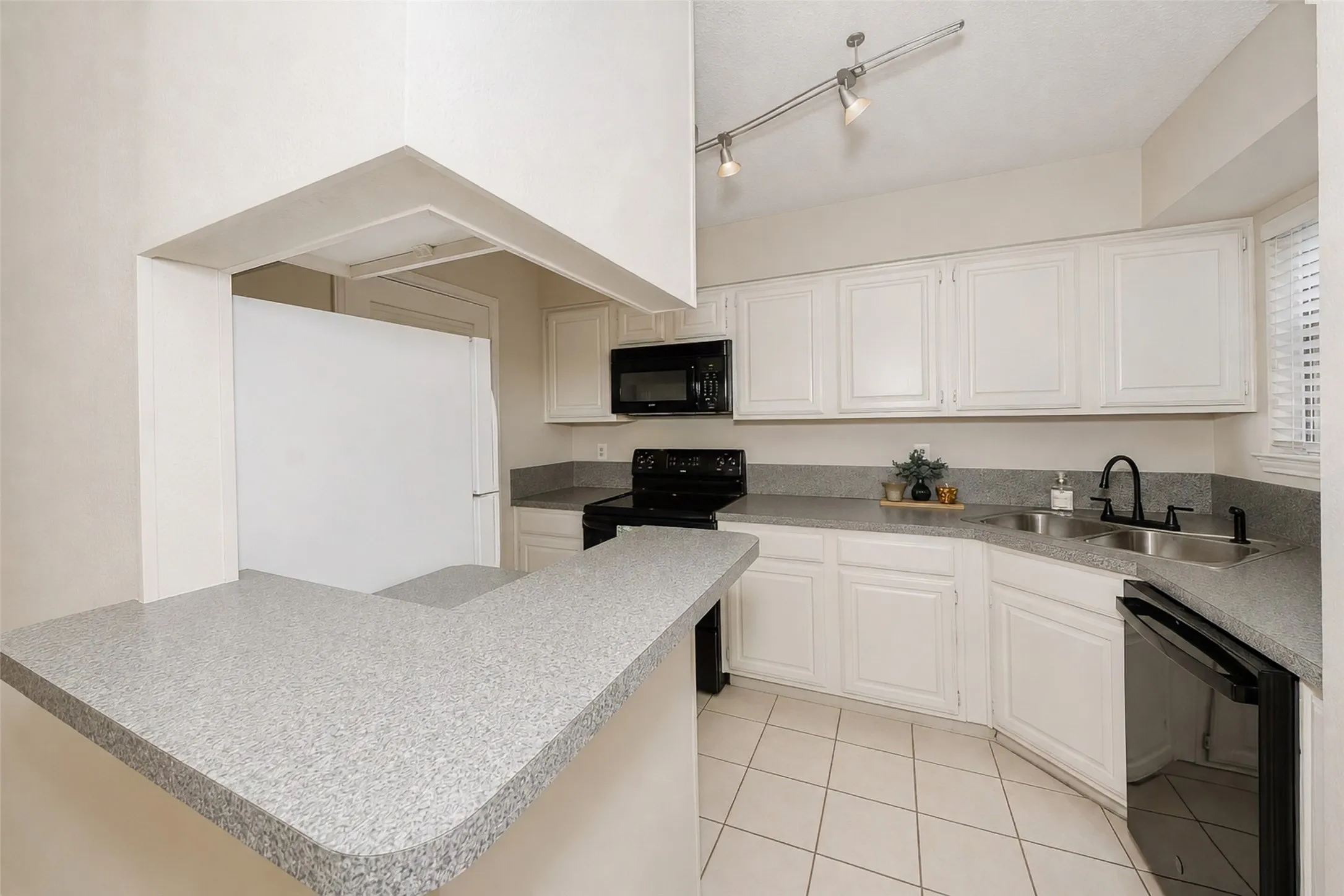 Extra seating at the breakfast bar. Fridge stays as well.