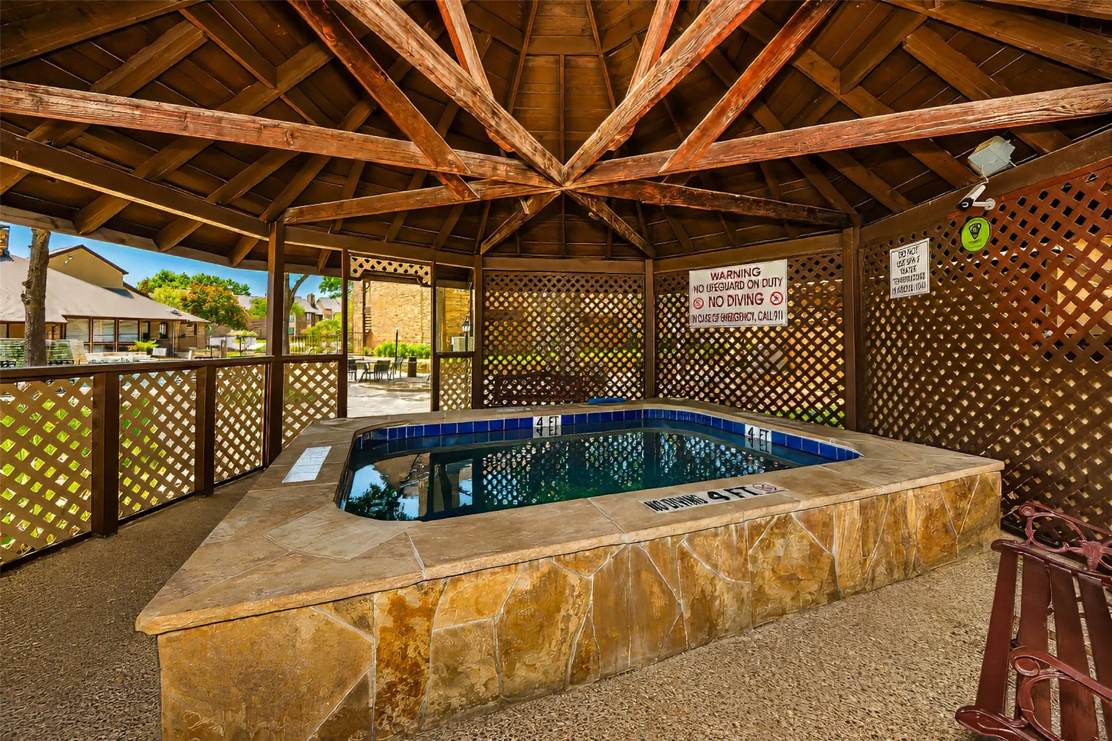 End your day relaxing in the covered spa.