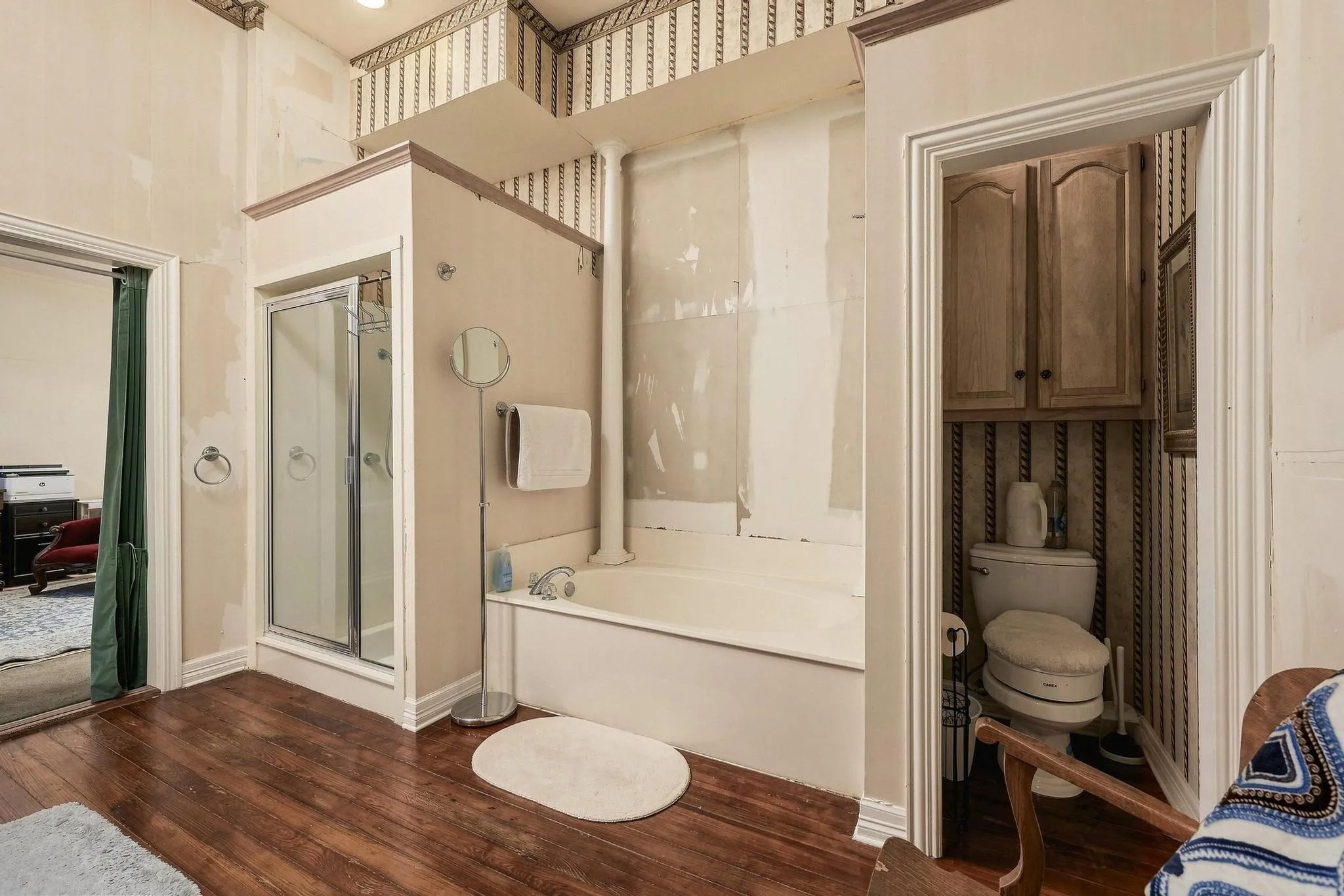 Primary Ensuite shower garden tub and personal room