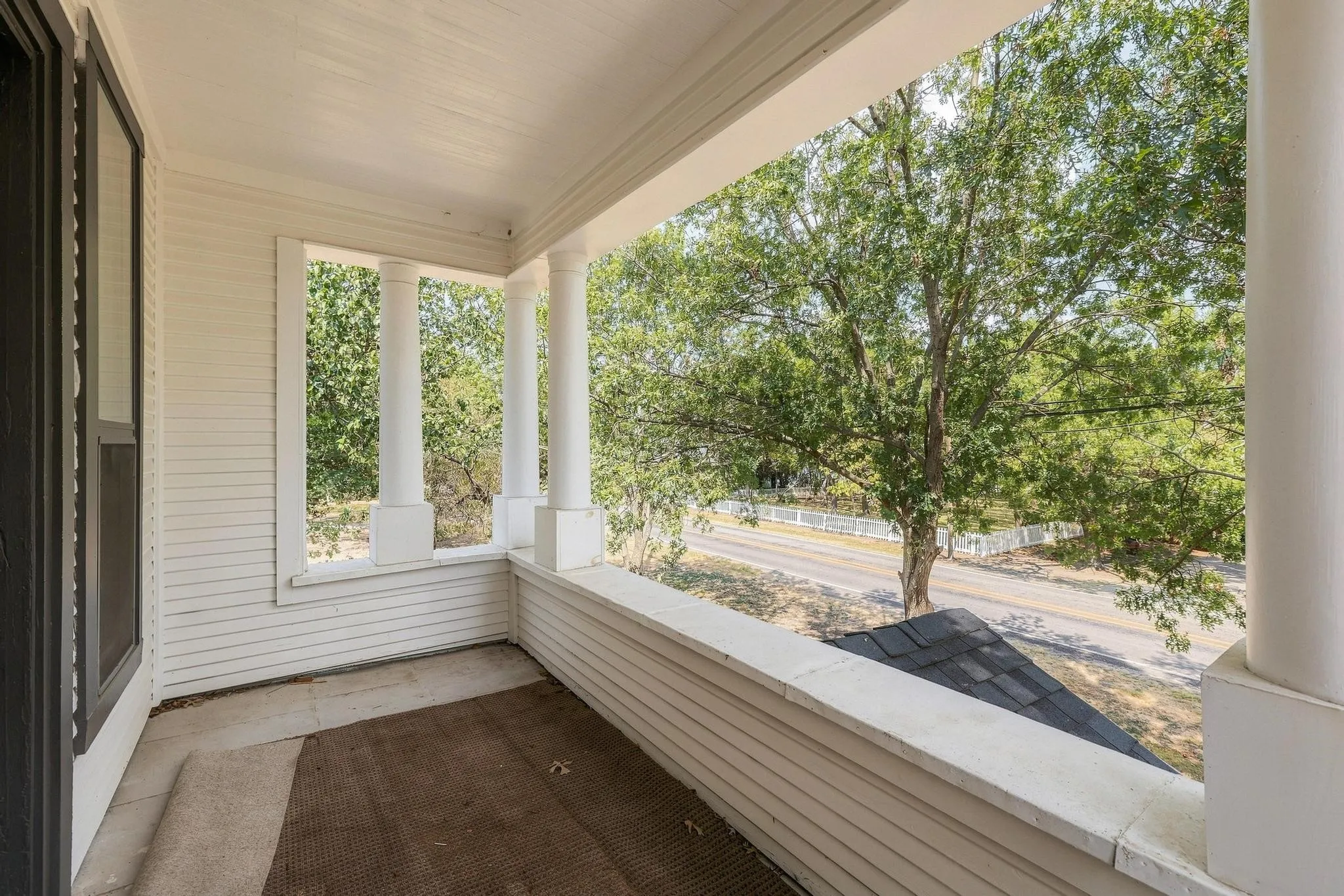 Balcony porch off the 2nd bedroom facing the front yard