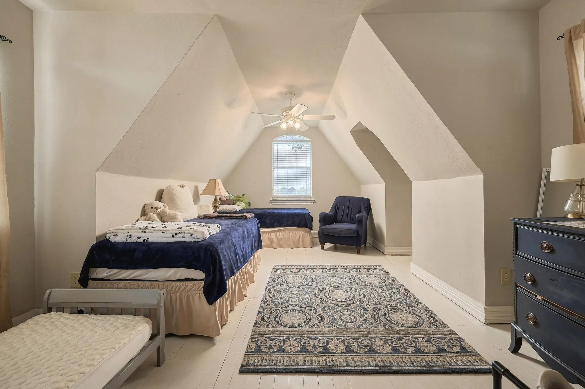 3rd bedroom with tilt ceilings and plenty of headspace