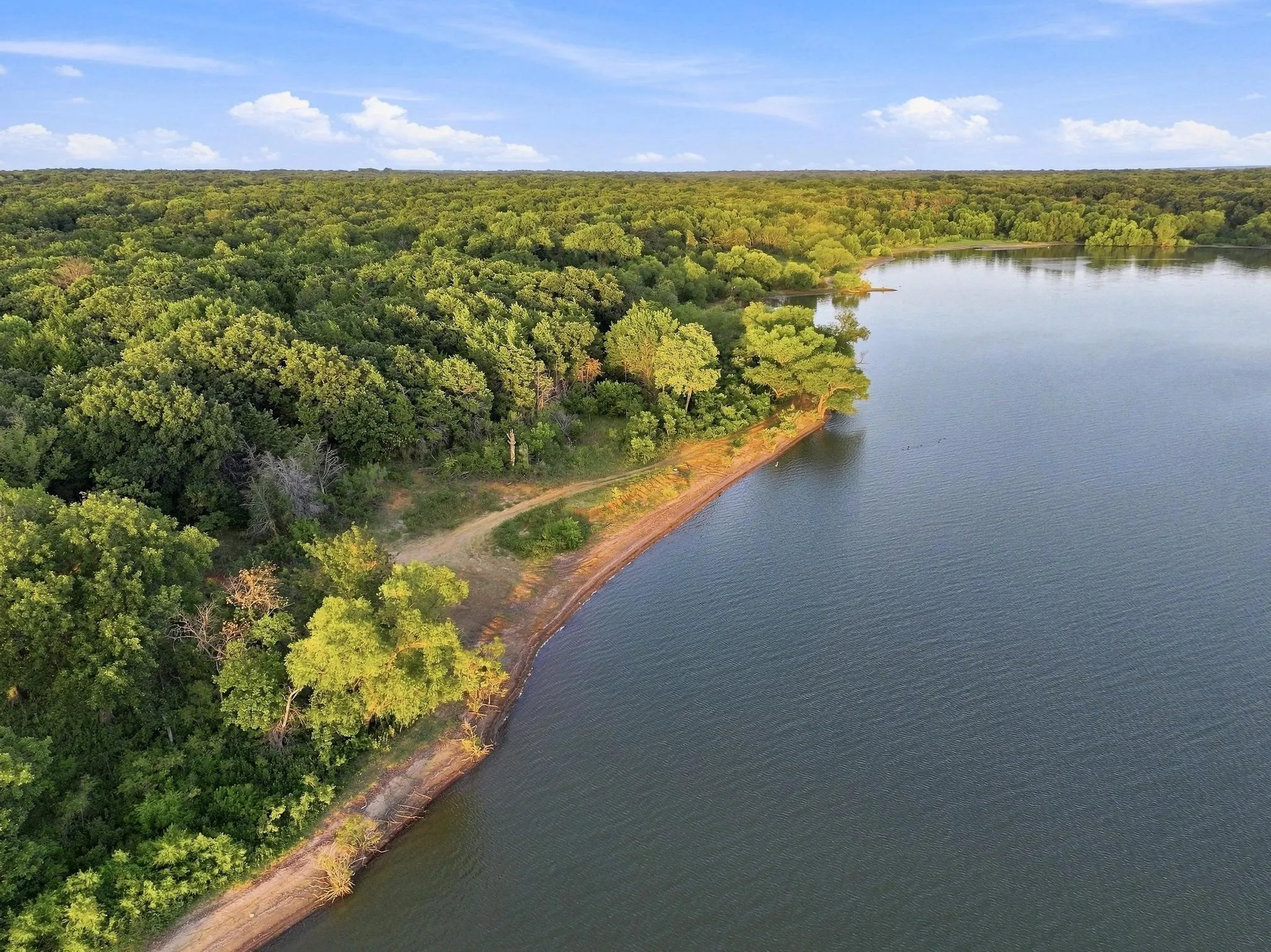Shoreline access to swimming beach via path
