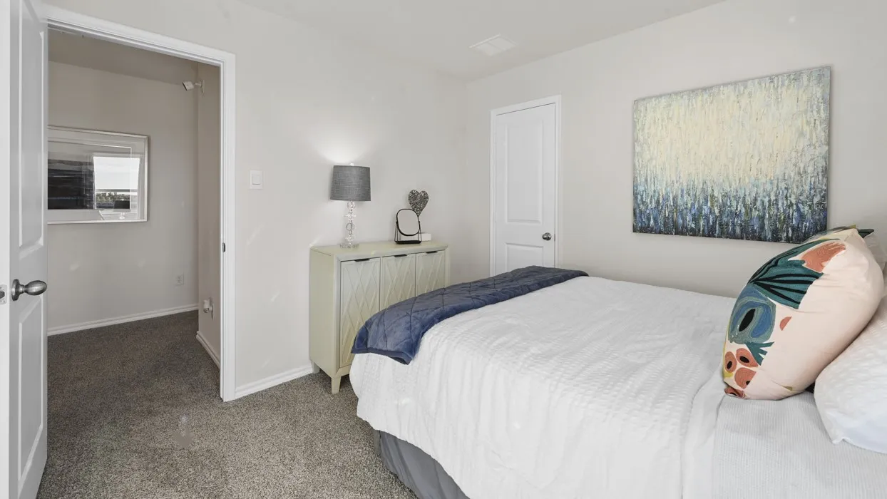 Neutral wall paint throughout, white interior doors, and gray carpet