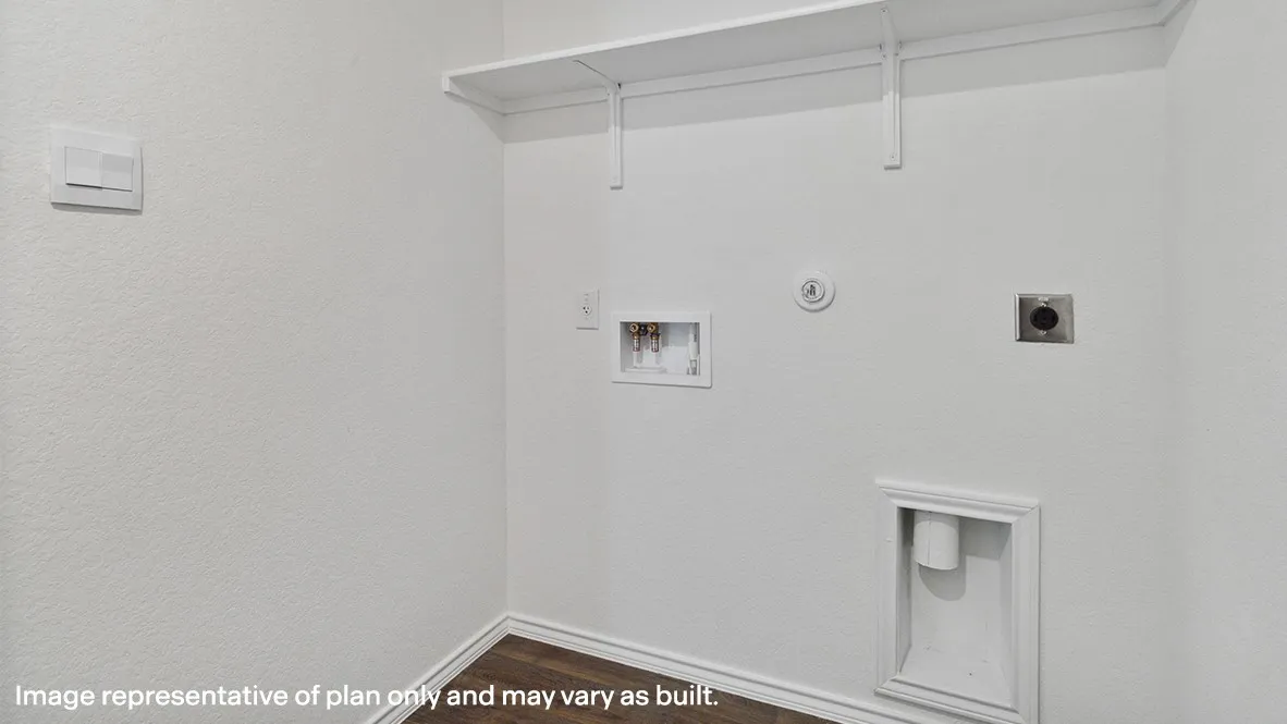 Laundry area featuring a built-in shelf, appliance hookups, and wood-finish flooring