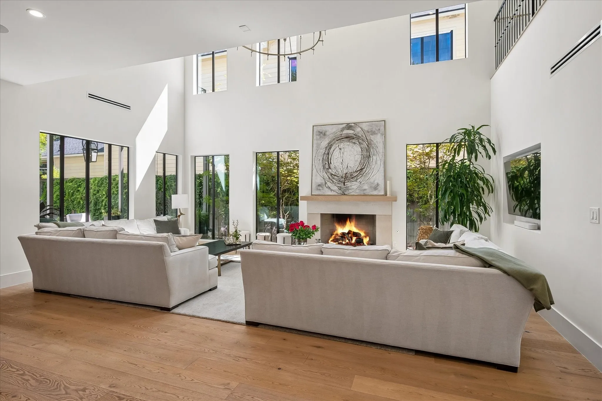 Soaring Ceilings, natural light filled interiors, complimented by beautiful natural wood floors