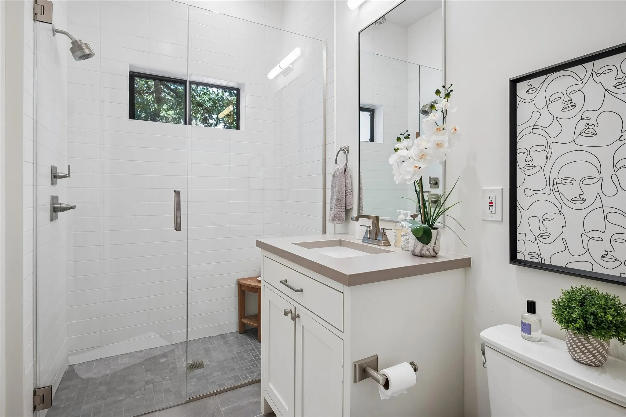 Main Floor Bathroom with Oversized Shower and Walk-in Closet