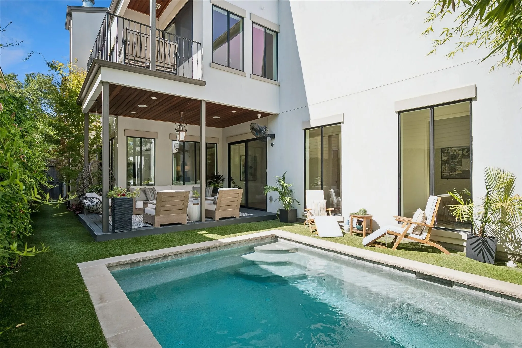 Backyard Oasis with Covered Patio entertaining area, heated pool, turfed yard