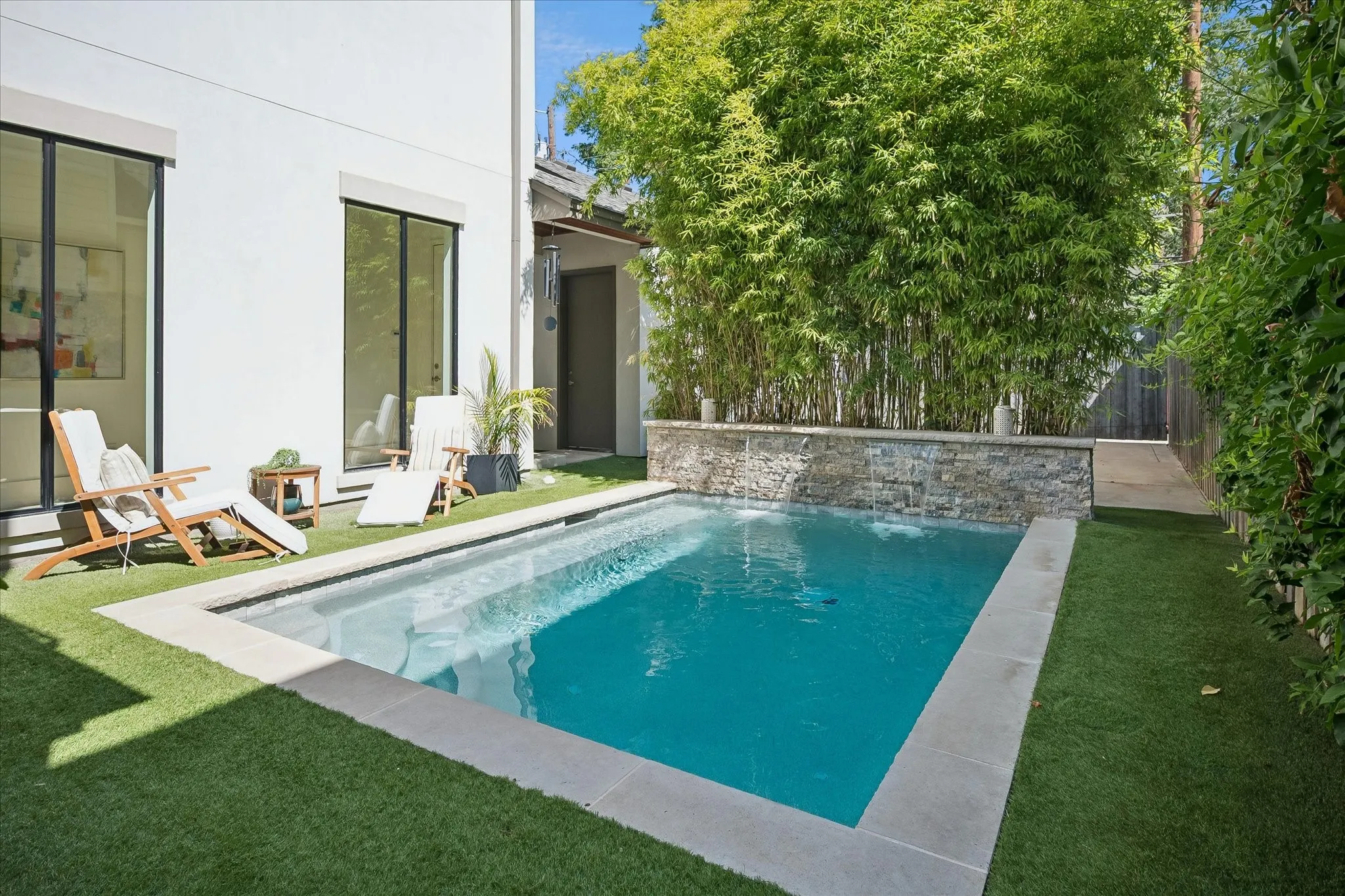 Heated Pool with water wall