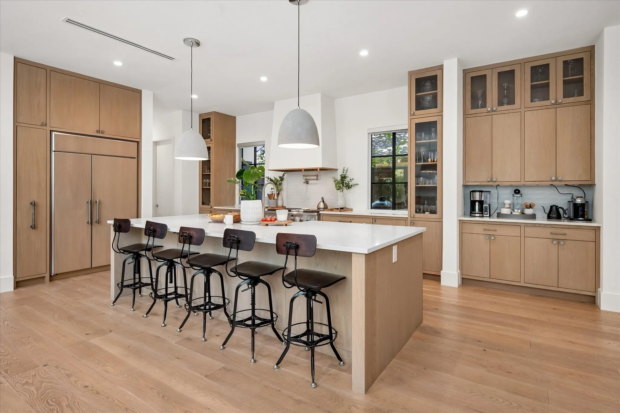 Oversized island, beautiful custom cabinets, commercial grade appliances