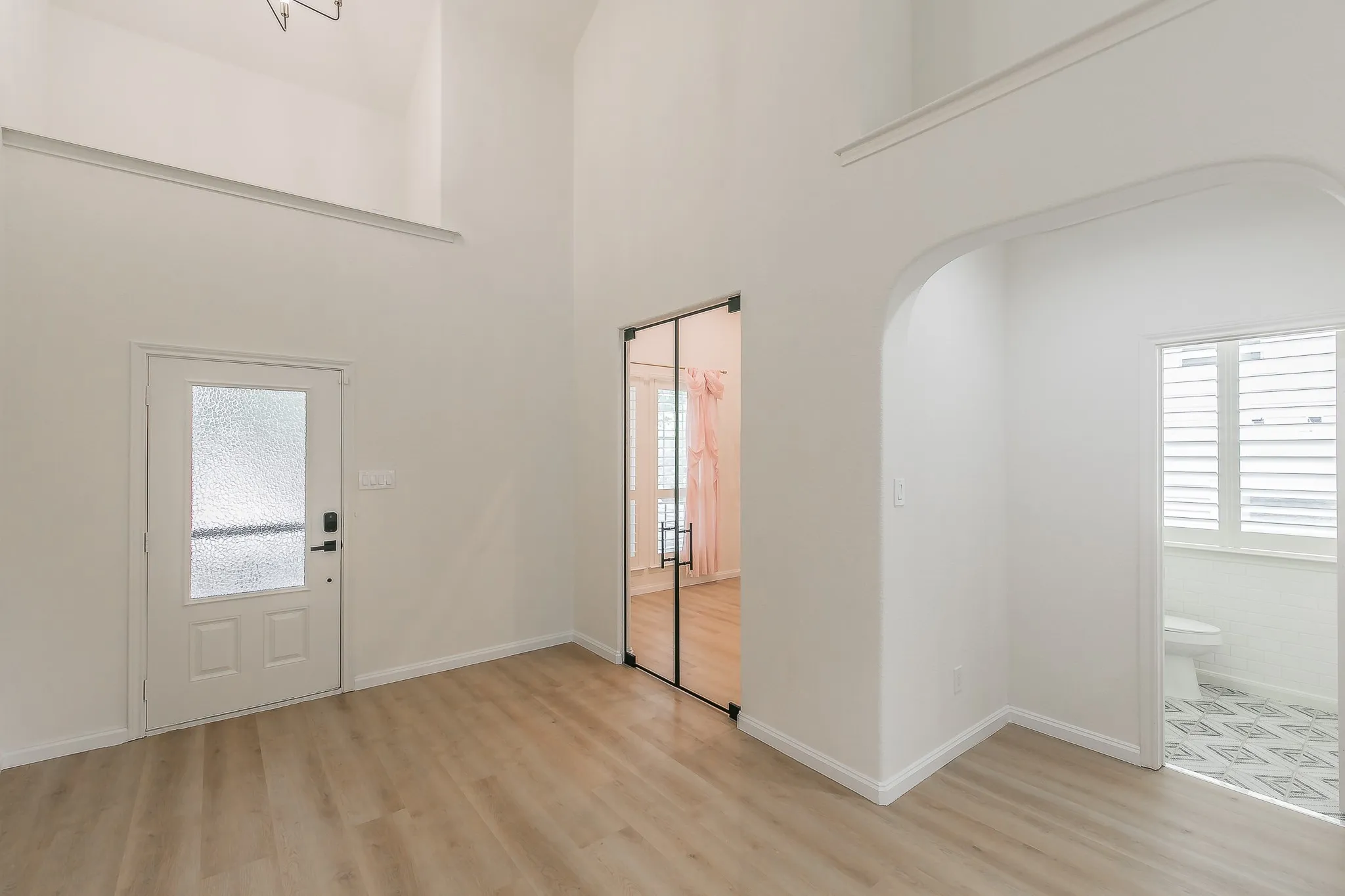 Soaring ceilings as you enter the home