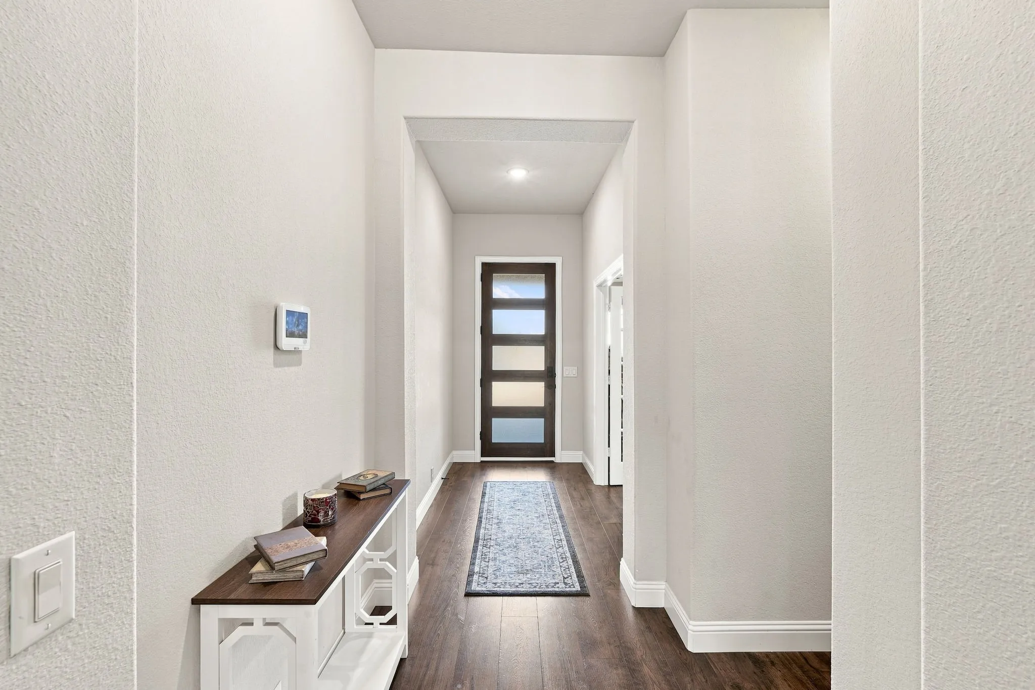 Step inside to a sophisticated open floor plan with a well-located and convenient home office