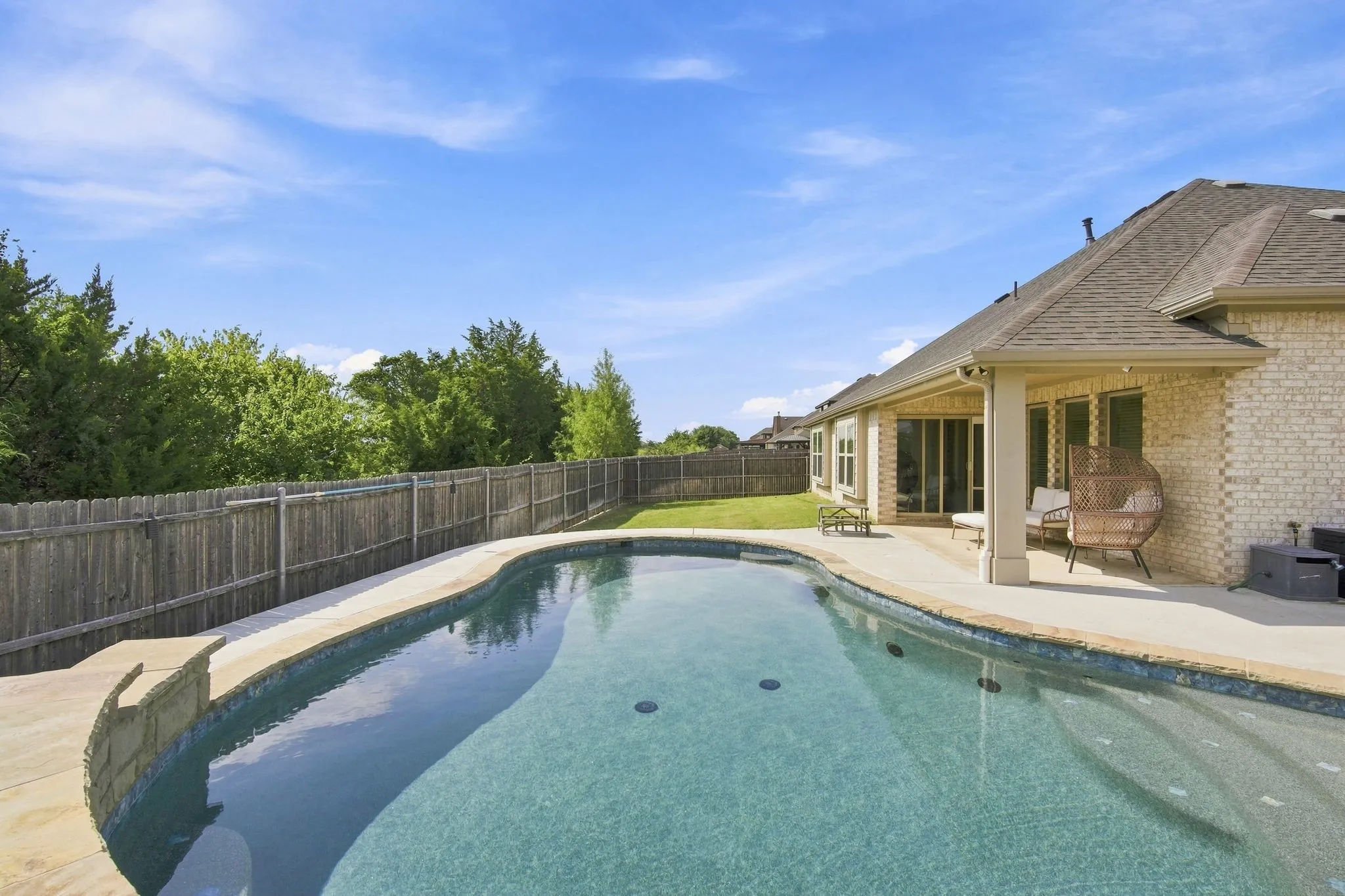 A well-maintained pool is a prime feature in this home