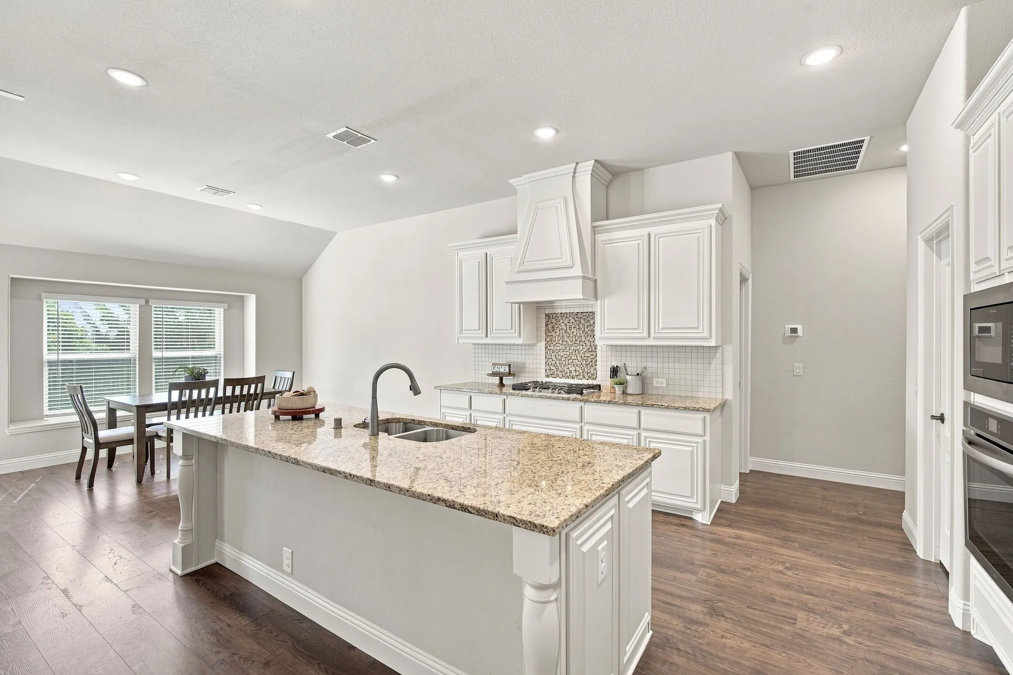 Enjoy the spacious workflow areas adjoining the dining area with abundant natural lighting and window seats